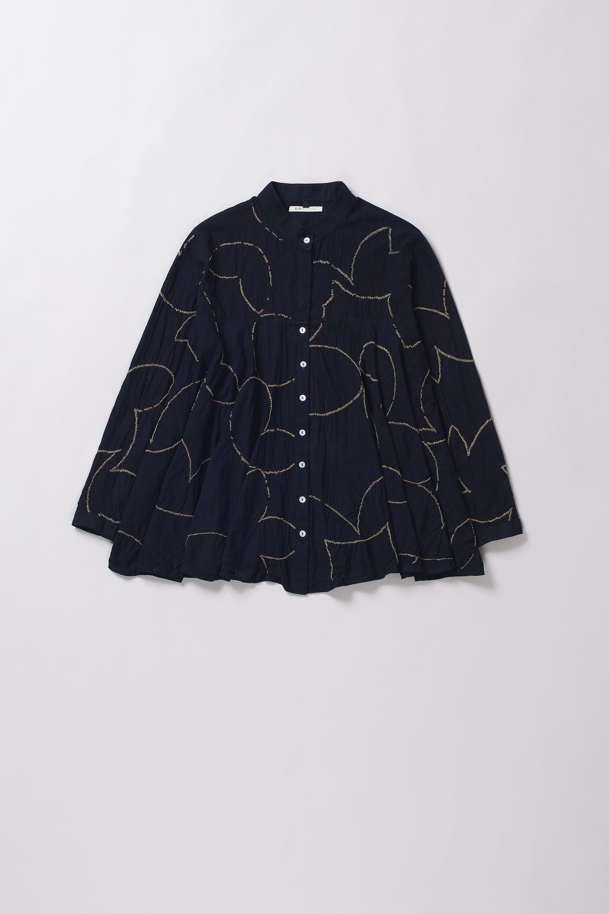 Black shirt with abstract gold patterns