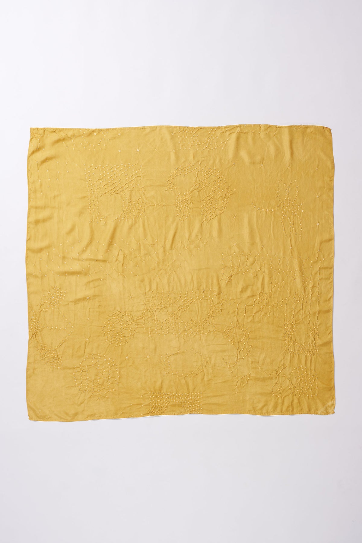 Yellow textured fabric square