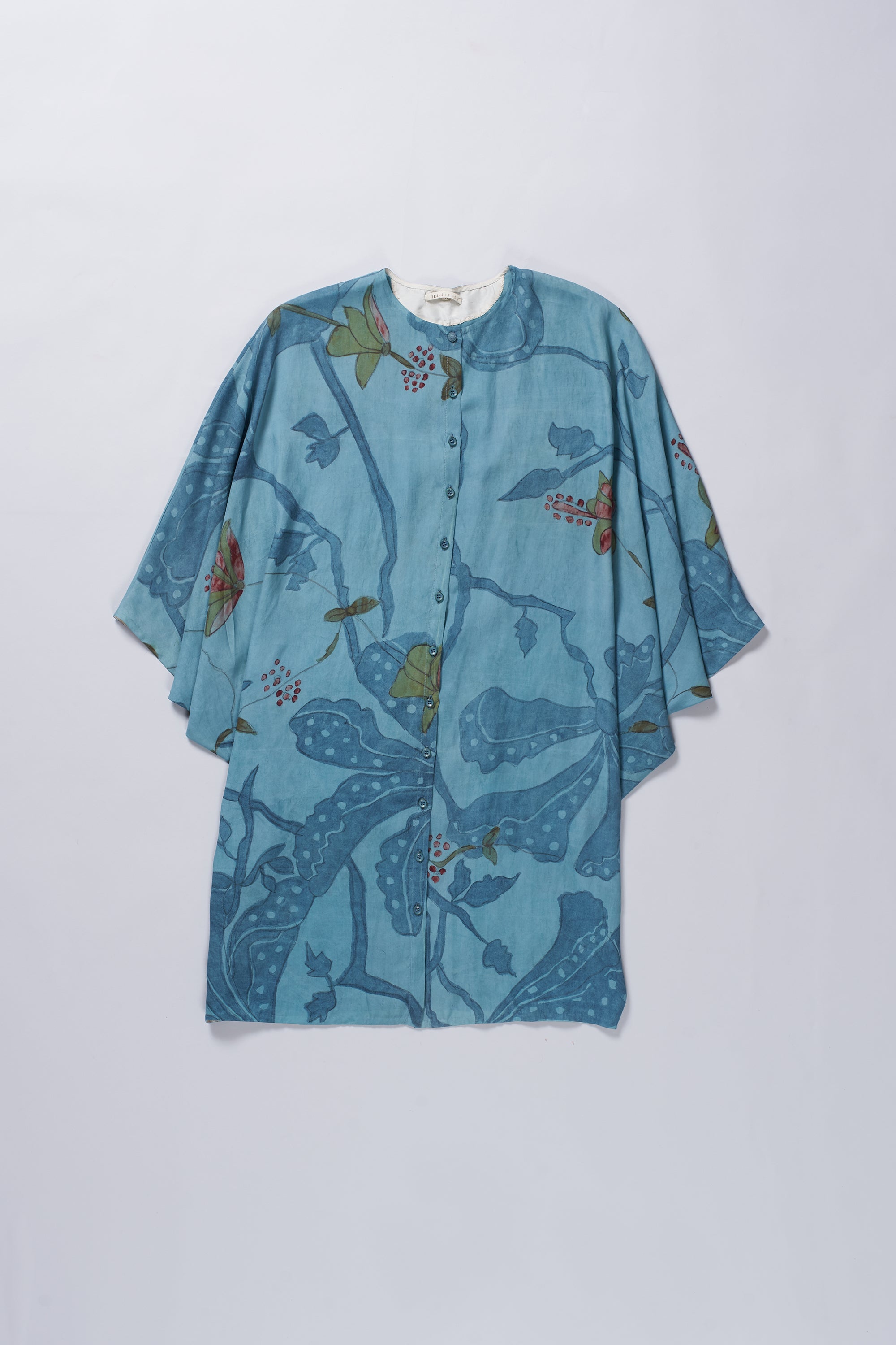 Blue dress with floral pattern on a white background