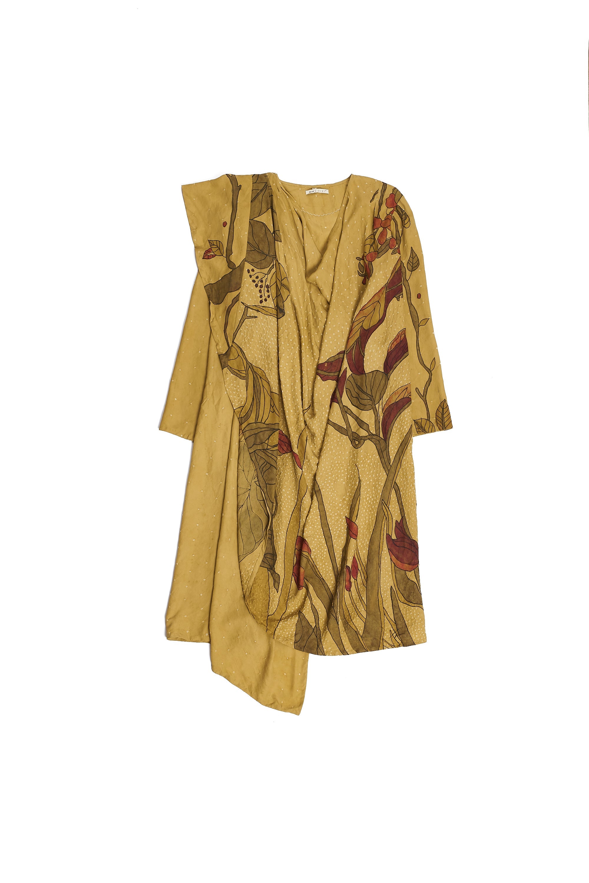 Long, patterned dress with a fitted bodice and flowing skirt