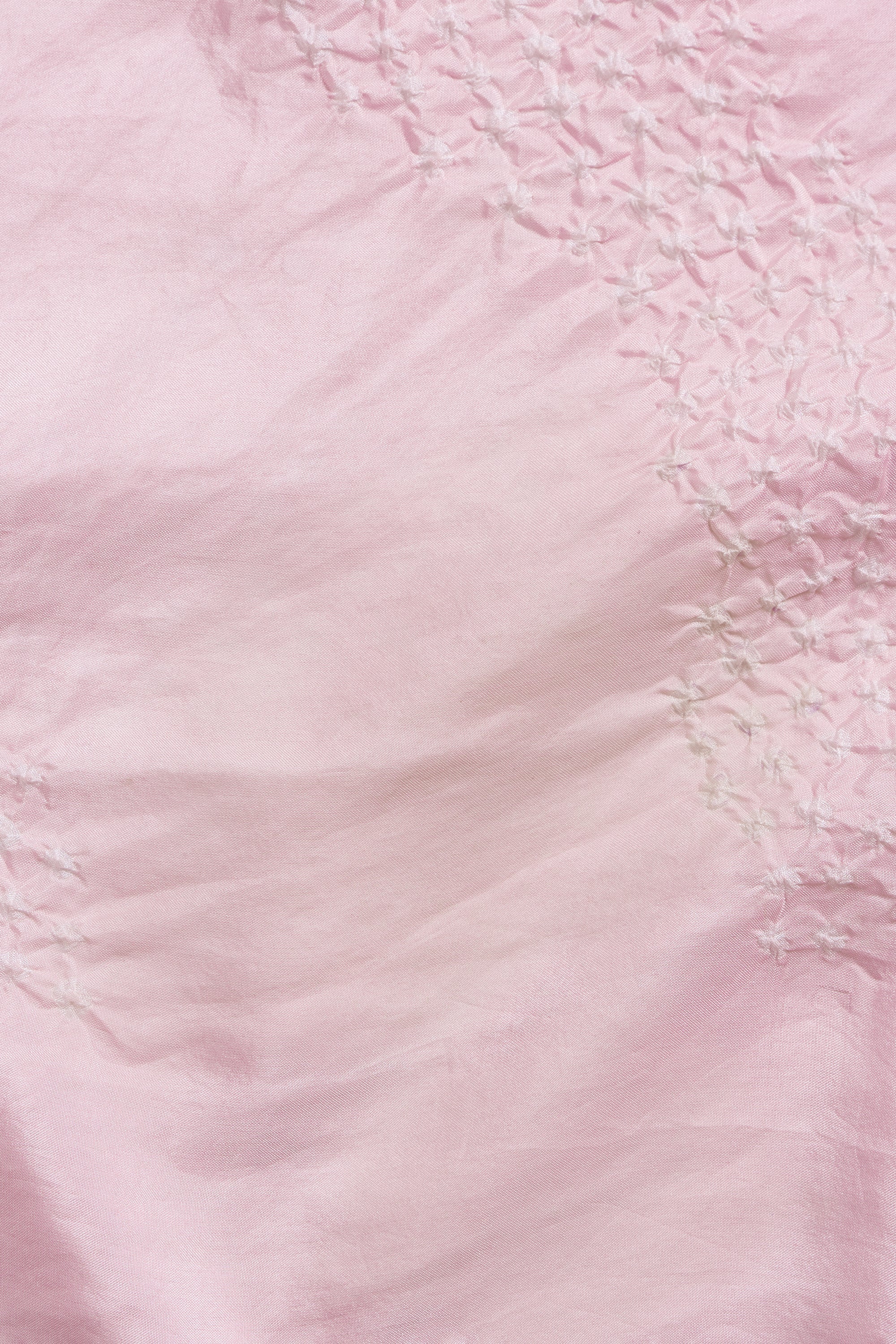 Close-up of a pink textured fabric