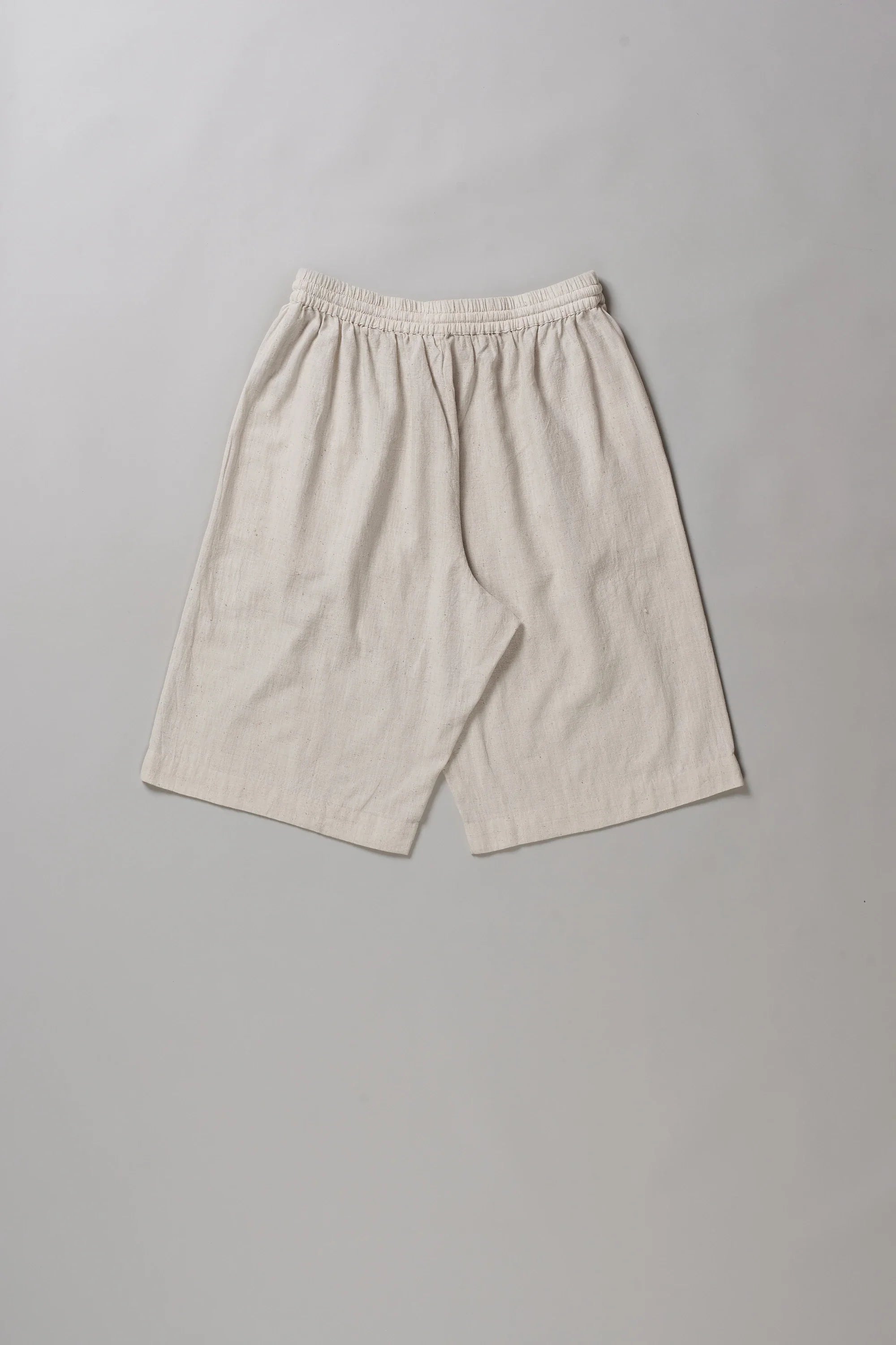 Back image of ecru shorts