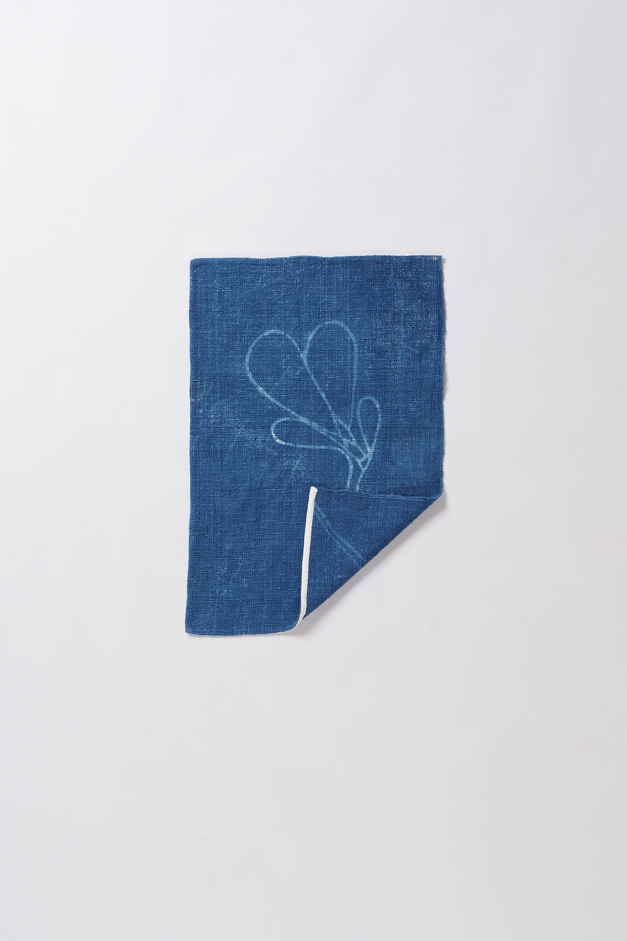 Blue fabric with white floral embroidery