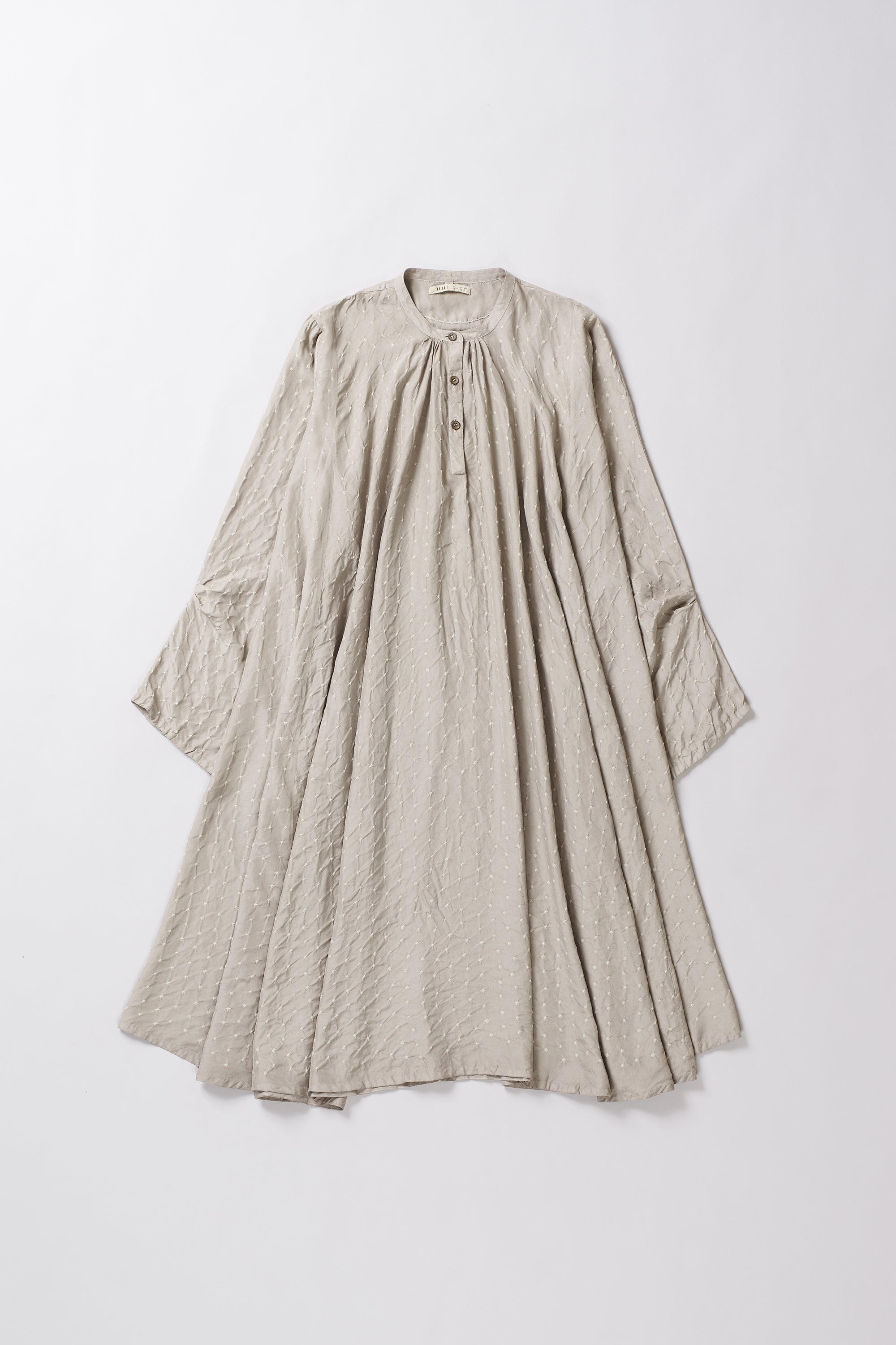 Beige dress with long sleeves