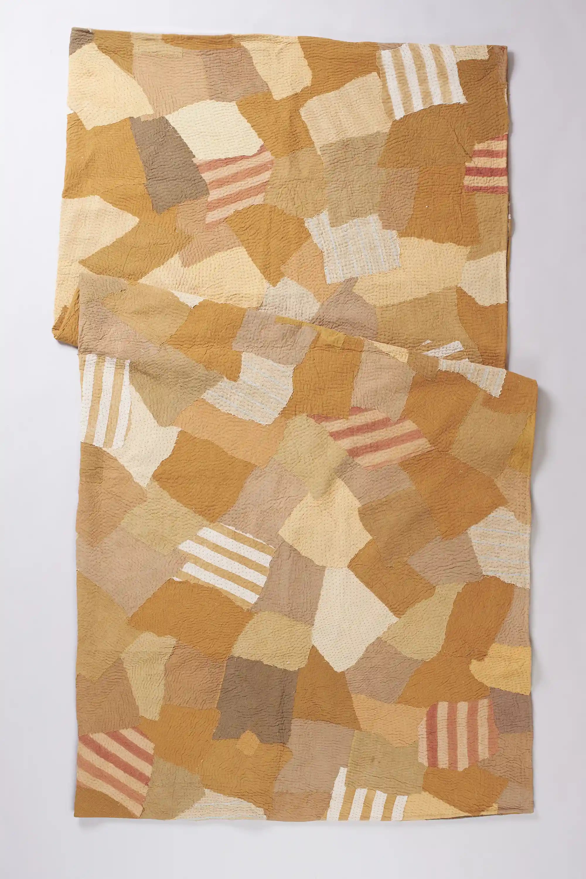 Yellow patchwork quilt