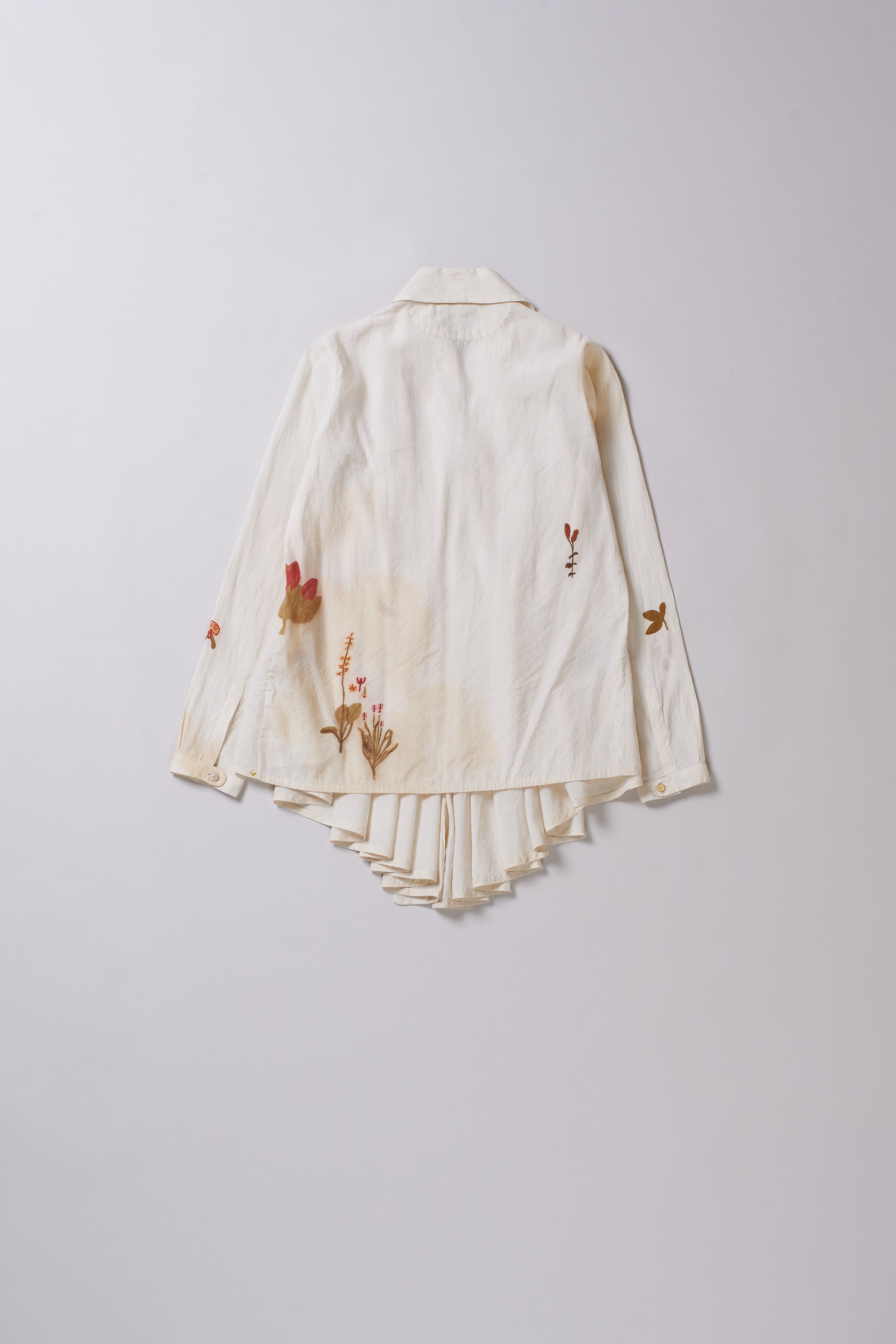 White blouse with floral embroidery