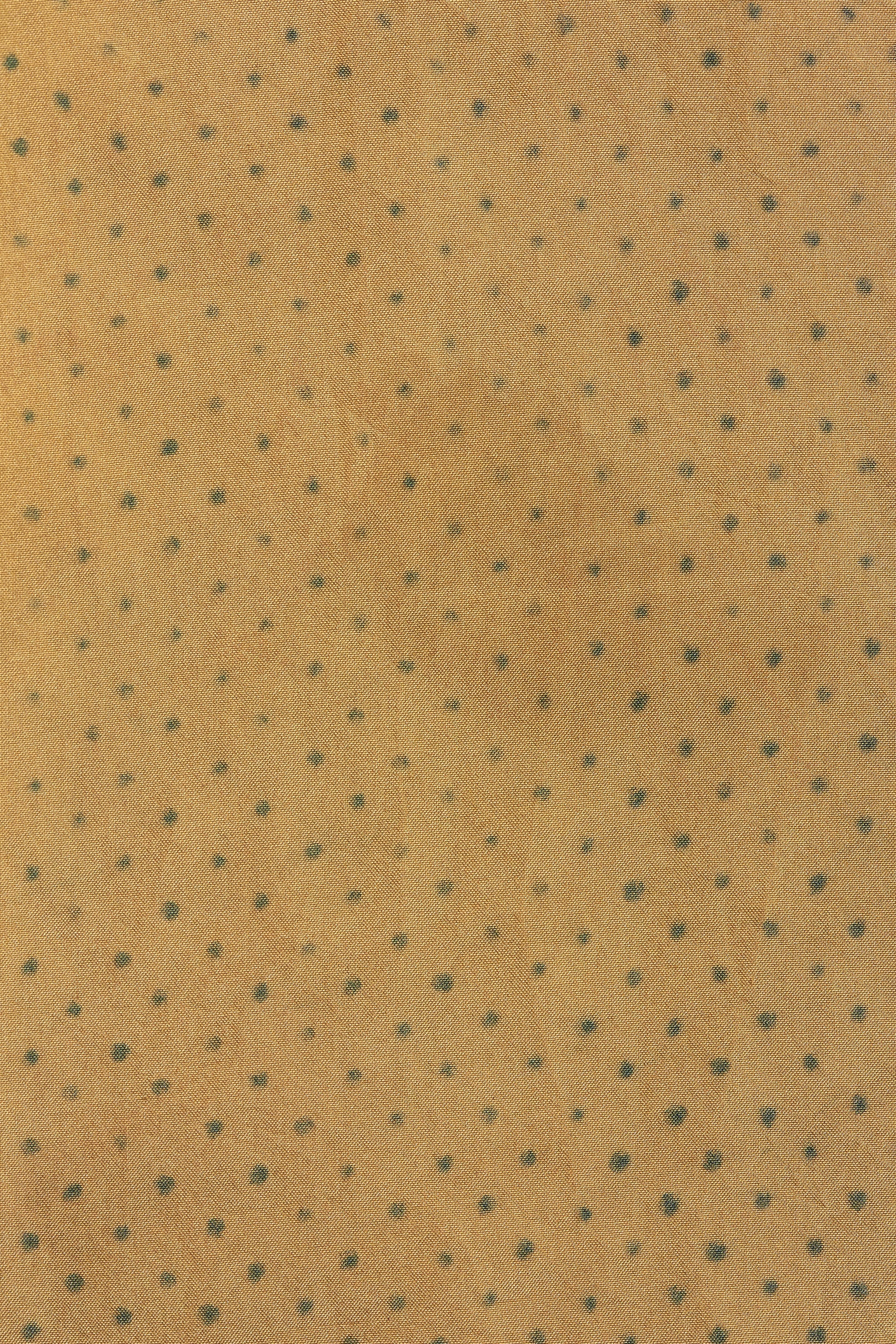 Brown fabric with small black polka dots