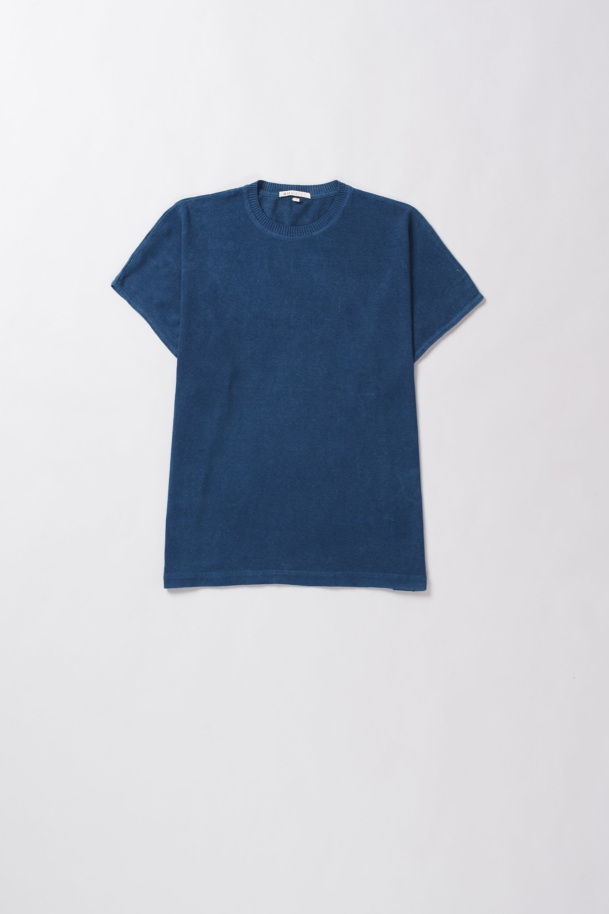 Blue t-shirt on a light gray background