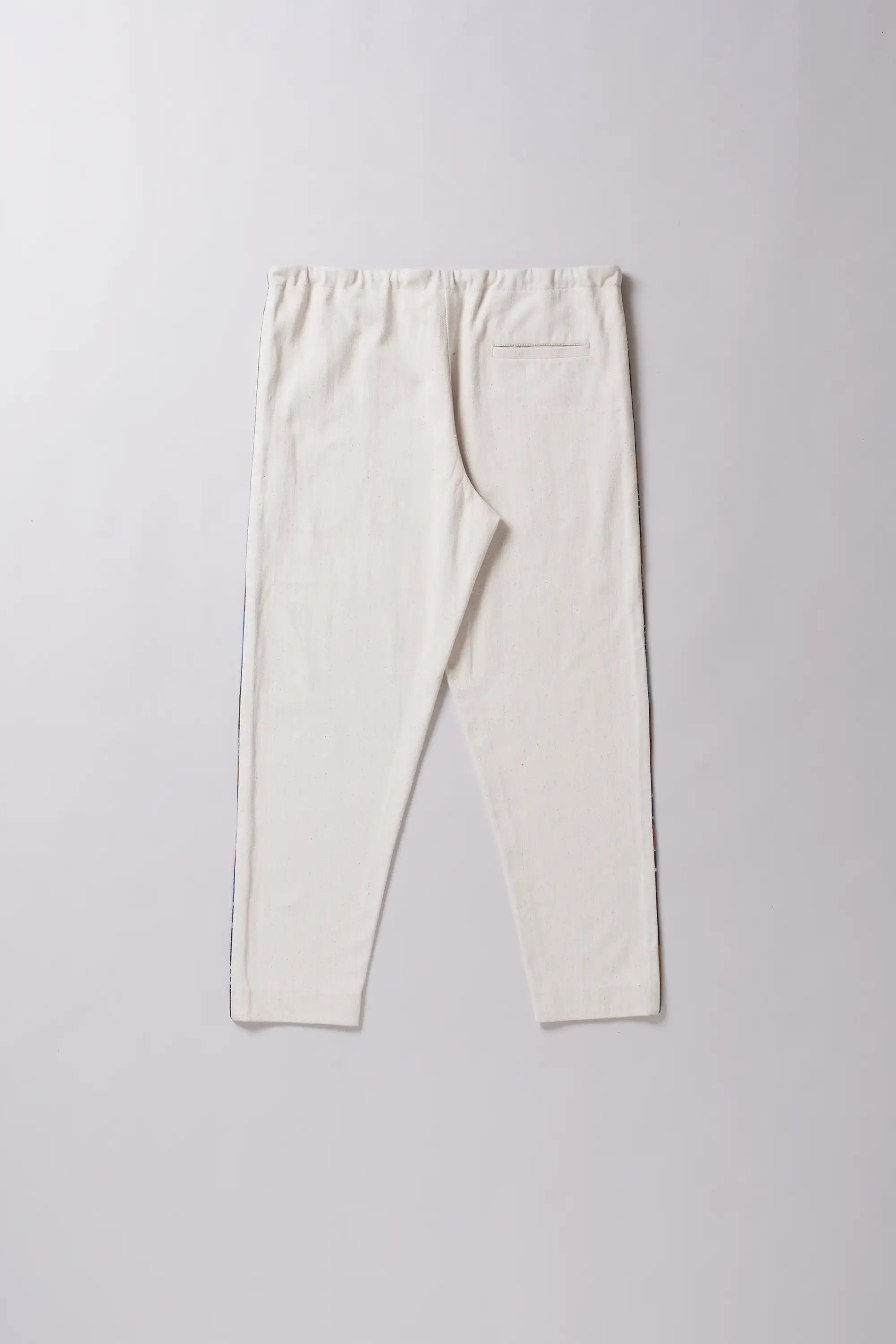 Back shot of a ecru string pant