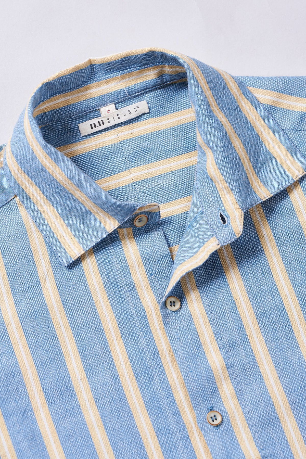 Fabric close-up with collar and buttons