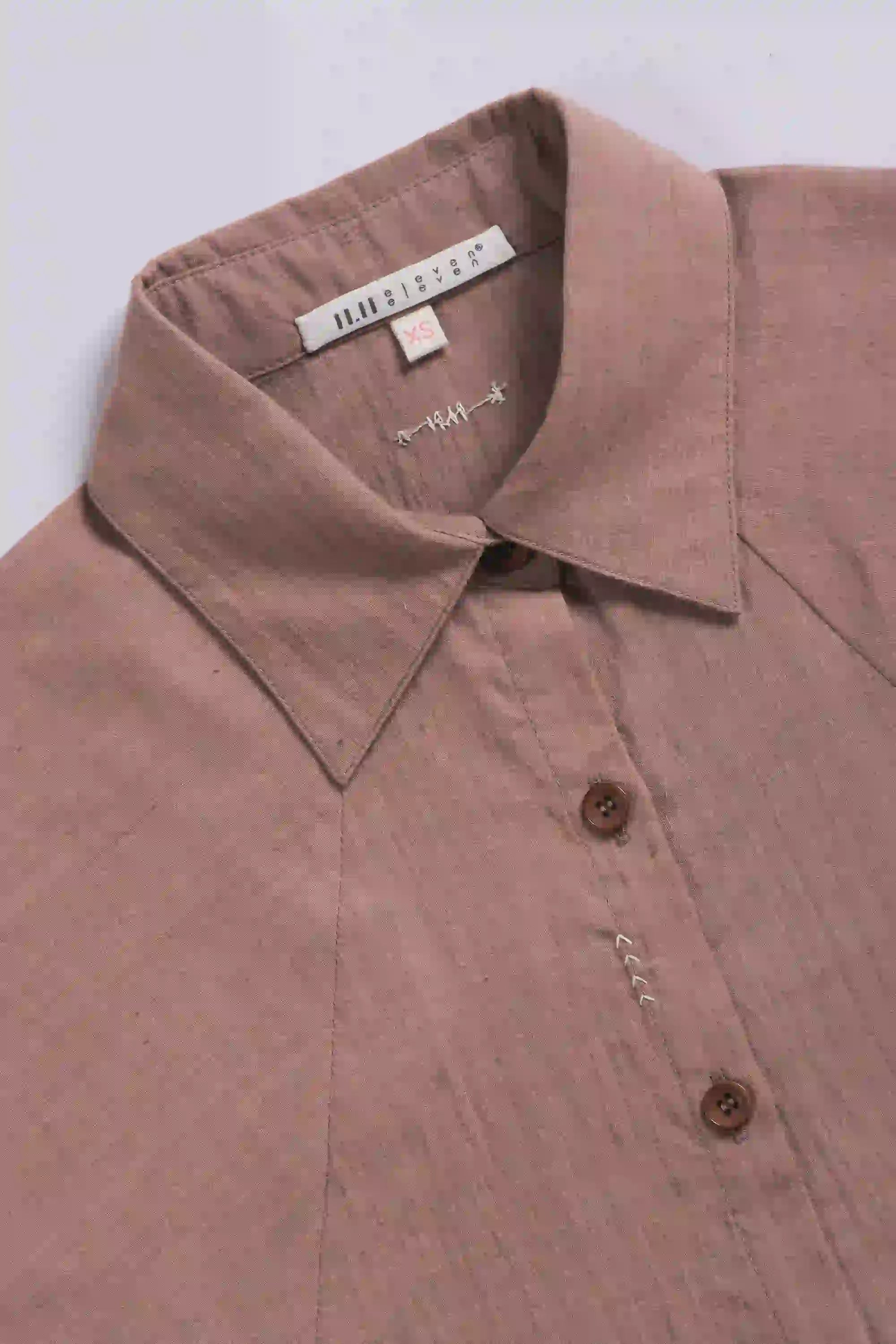 Fabric close-up with buttons and collar