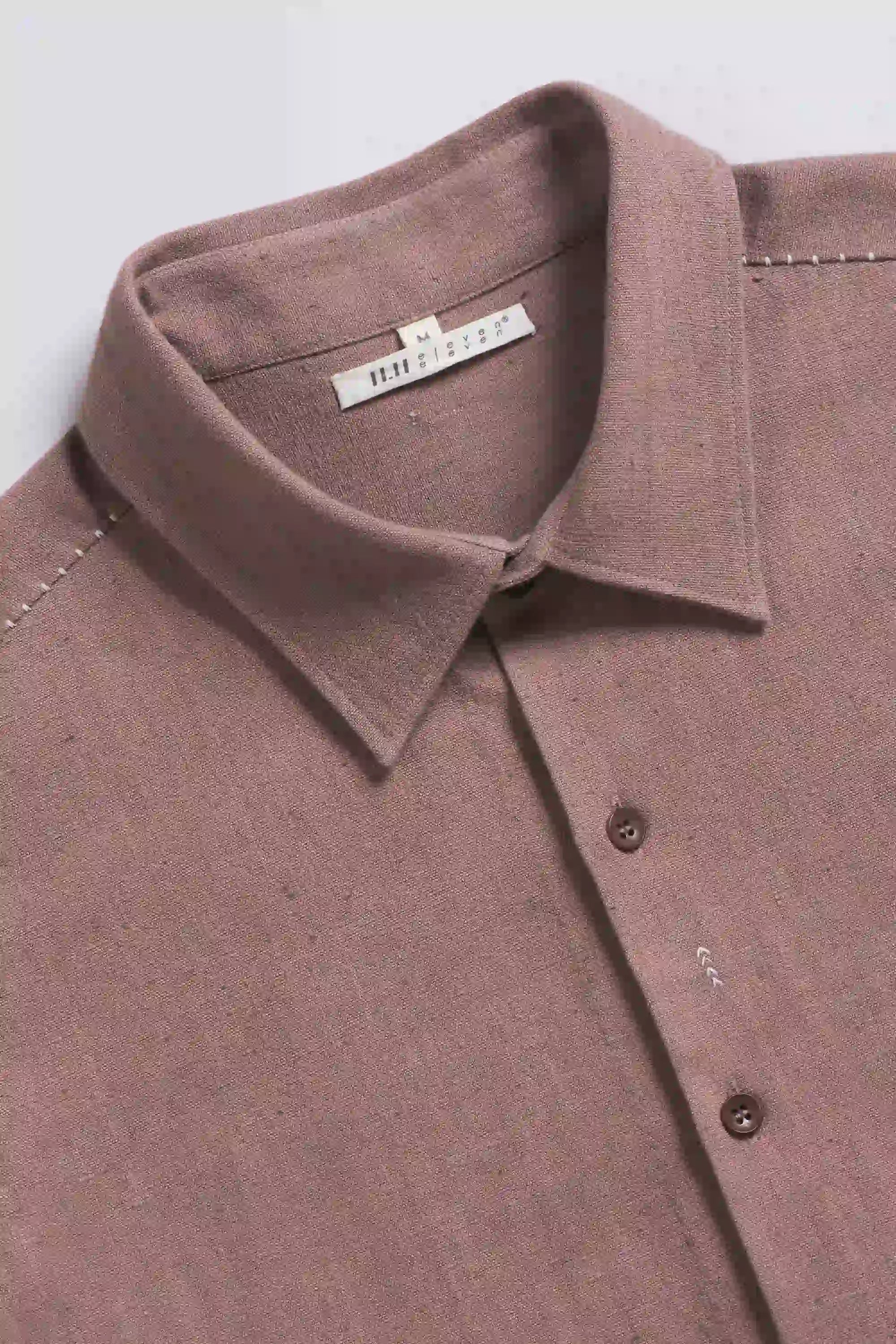 Fabric close-up with buttons and collar