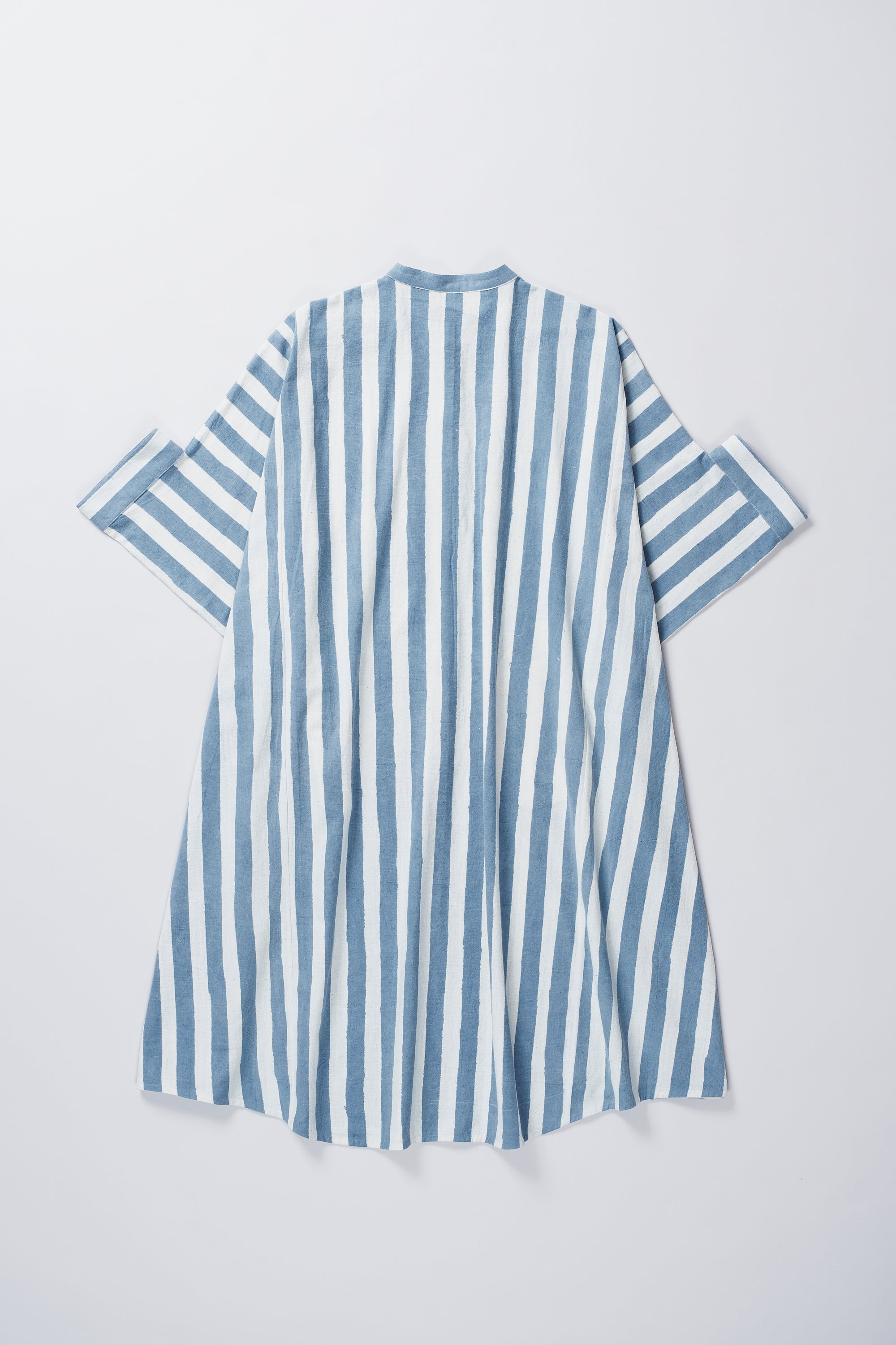 Back image of a cotton kaftan in medium indigo