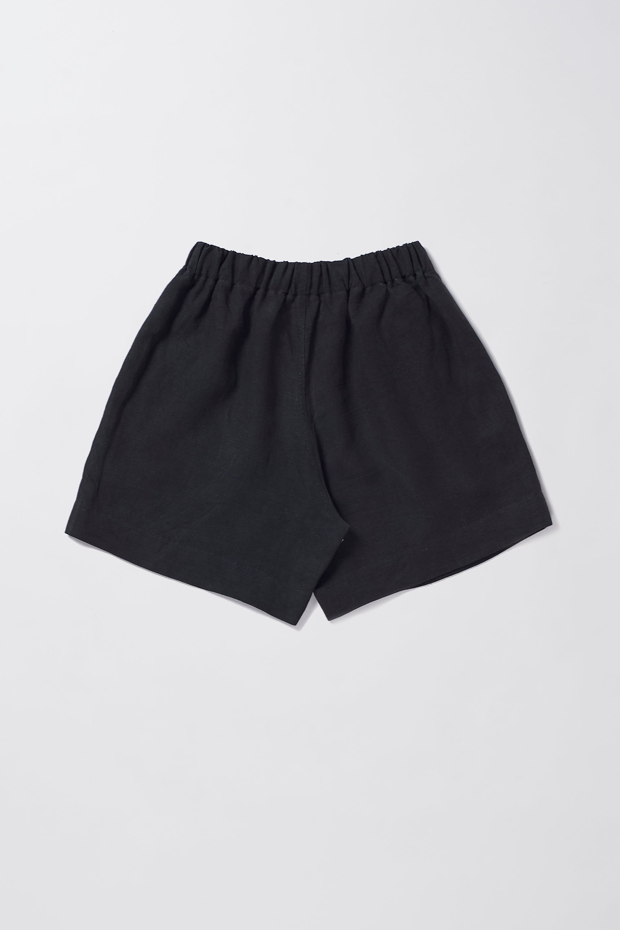 Back image of a black linen shorts