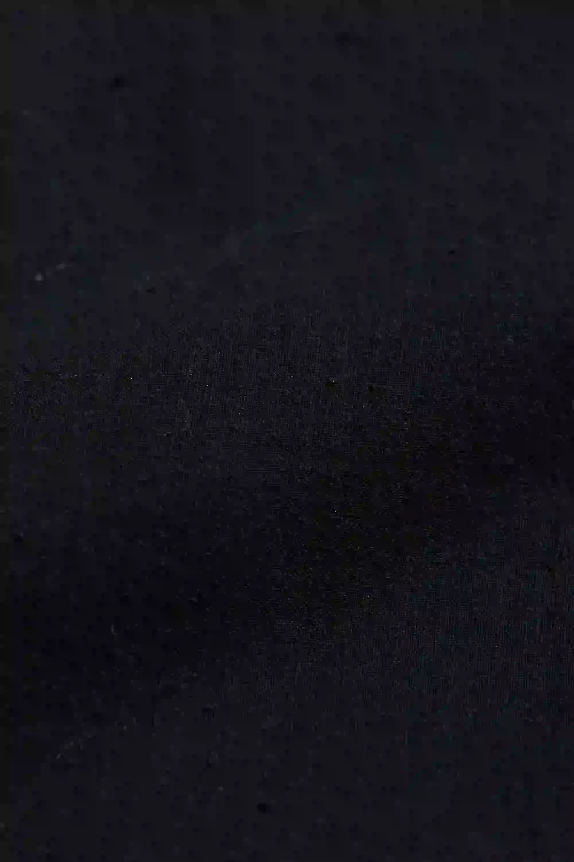 Solid black colour fabric close-up