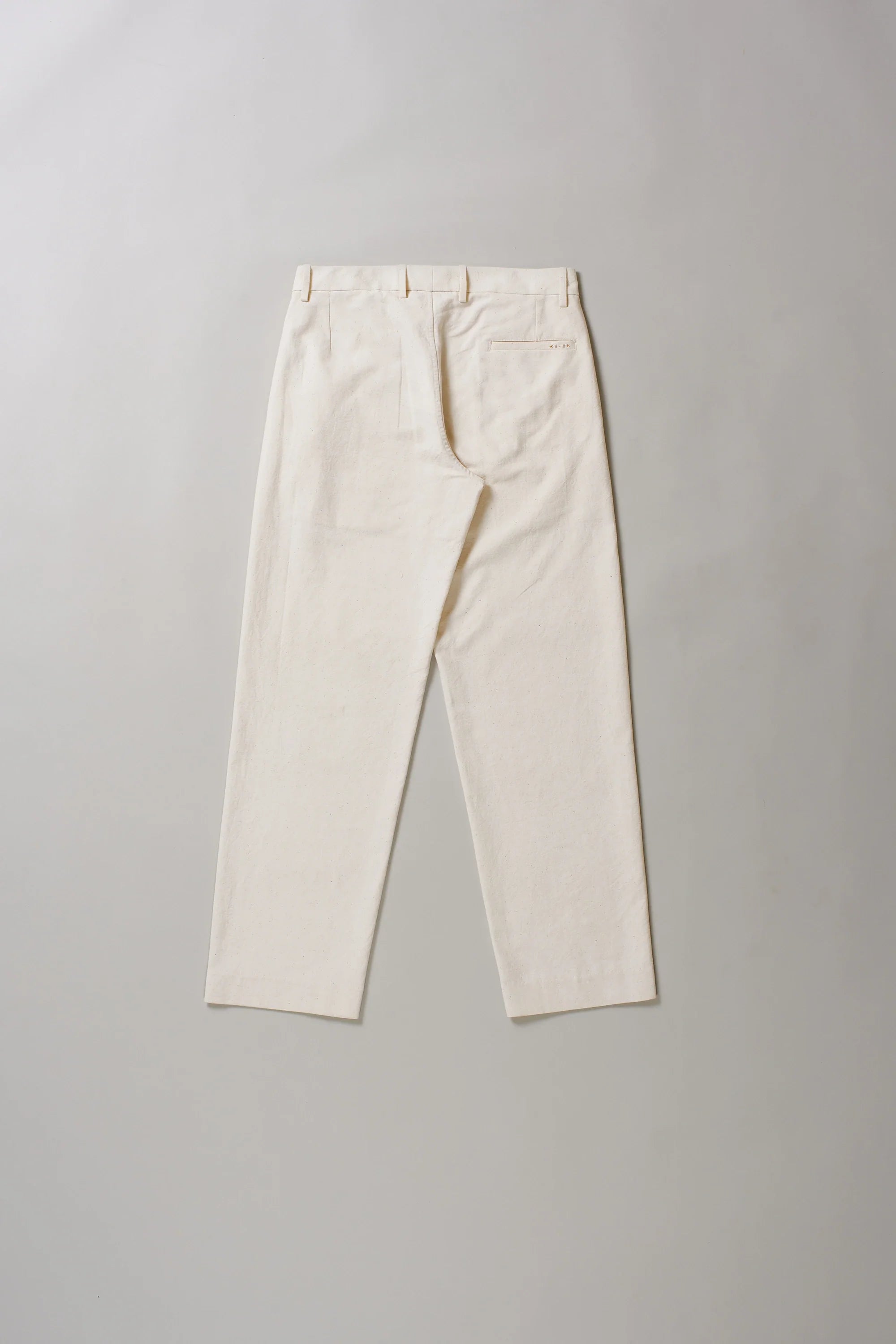 Back image of pants on a grey background