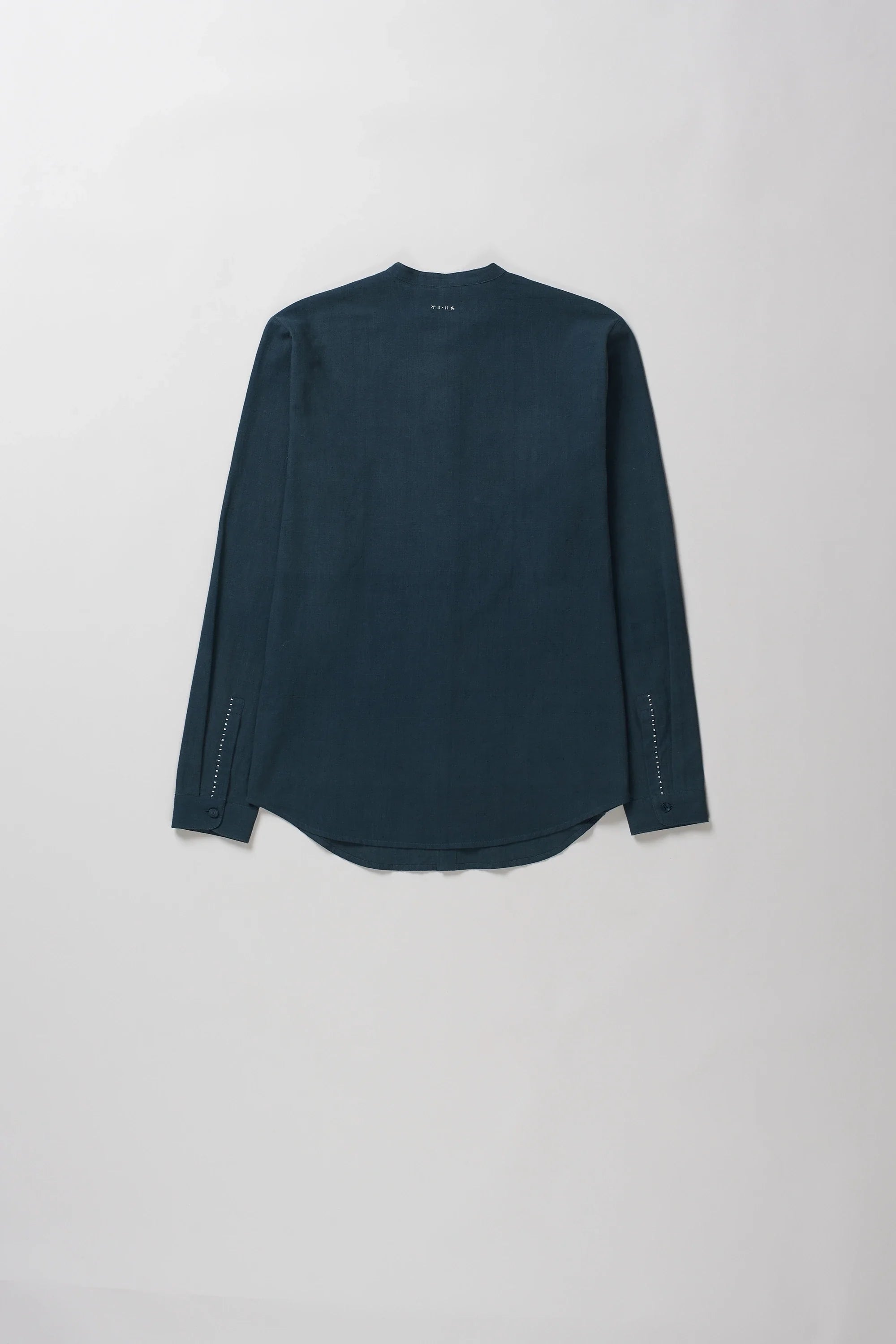 Back image of indigo black shirt with hand details