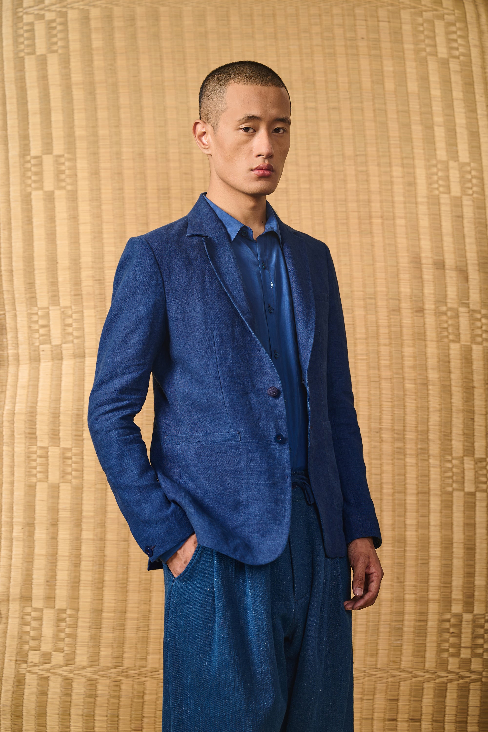 A man wearing indigo jacket