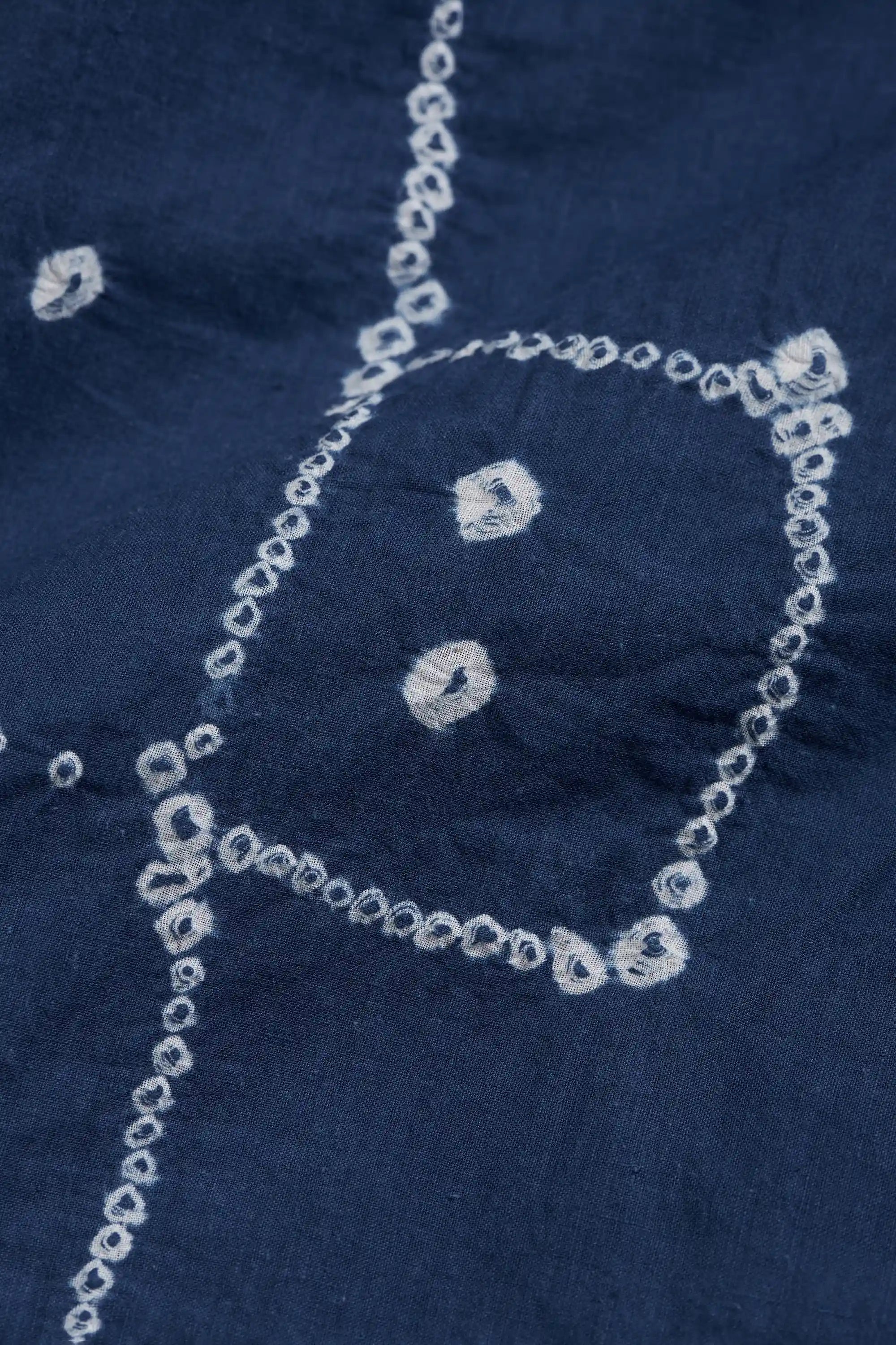 Close up fabric with bandhani.