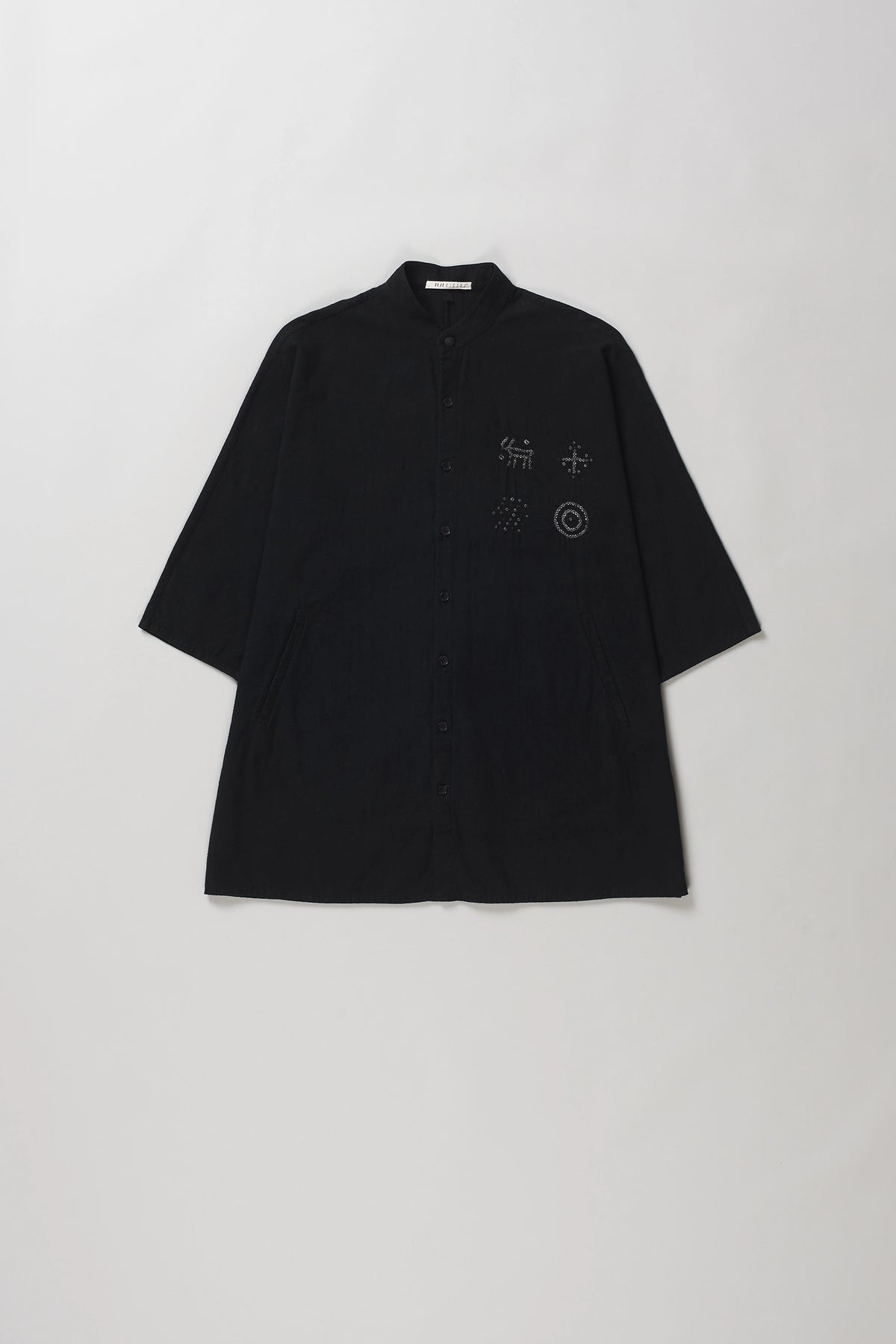 Front image of a black bandhani shirt