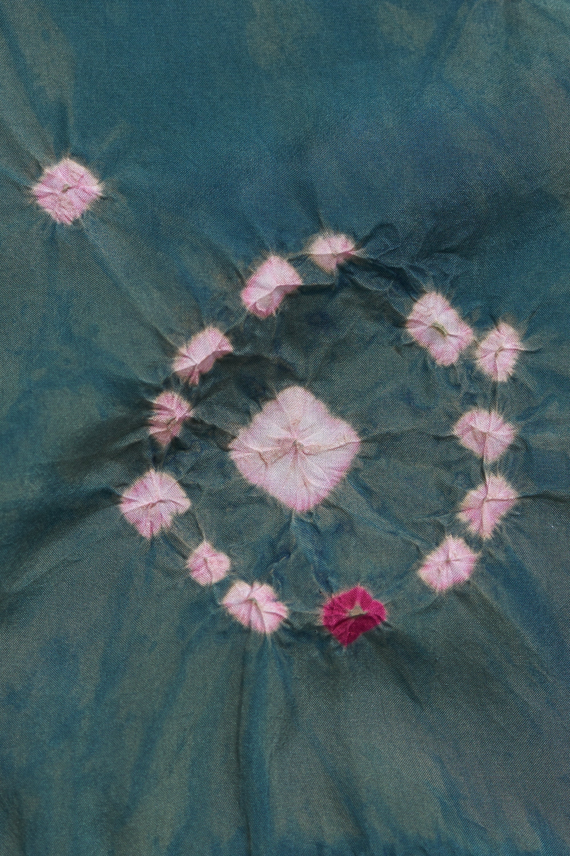 Pink flowers arranged in a circular pattern