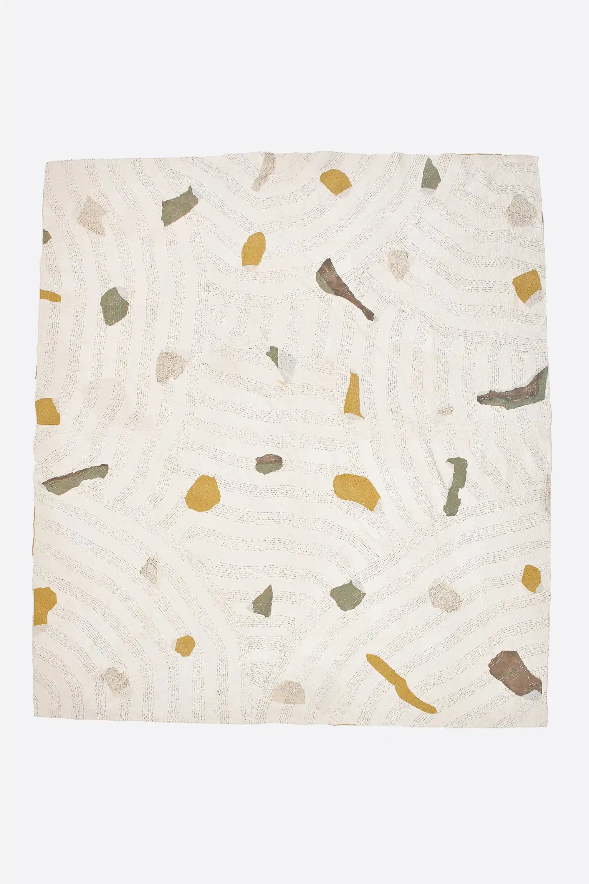 Textile with a terrazzo pattern on a white background