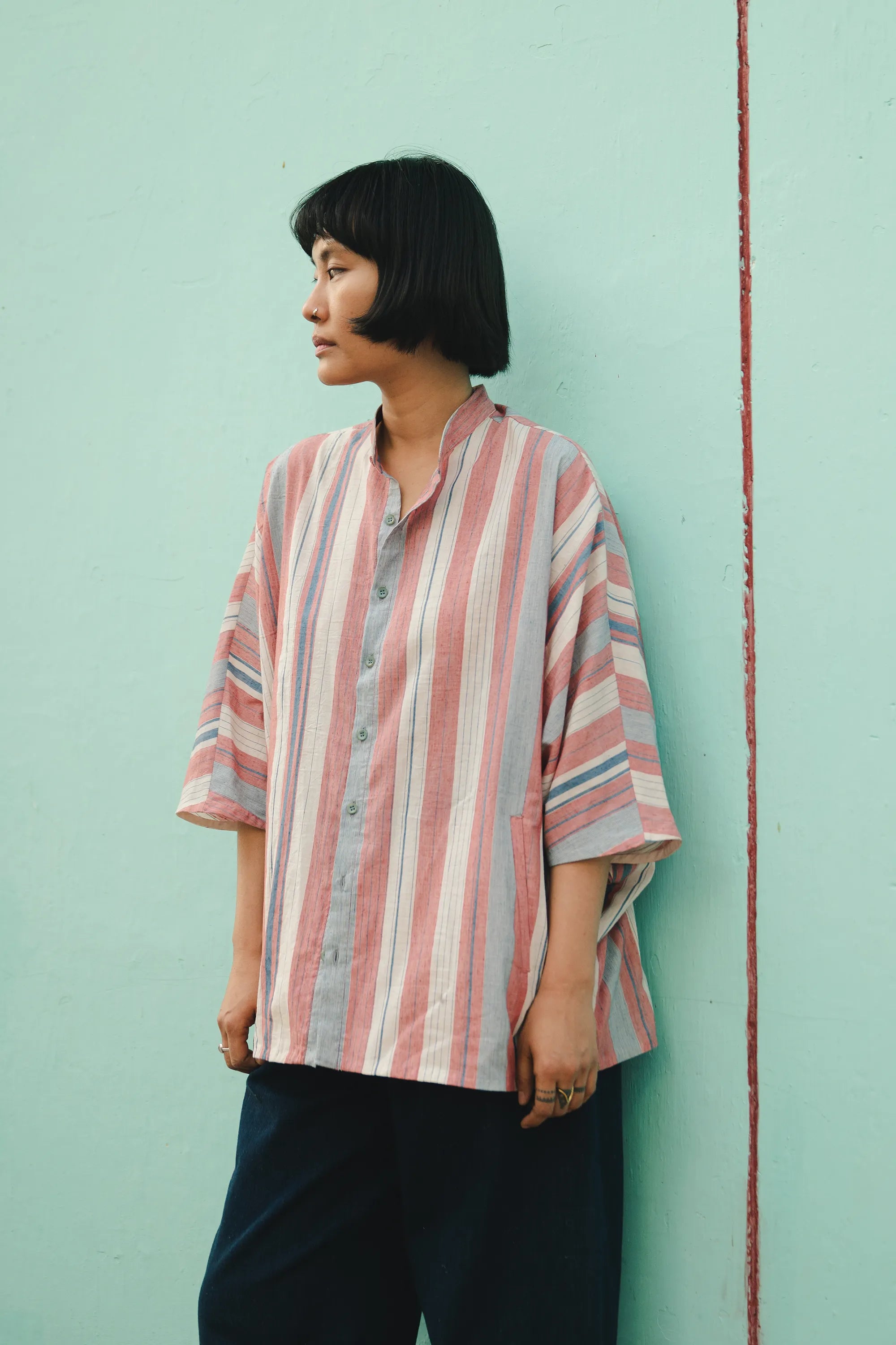 A side shot of women wearing cotton shirt