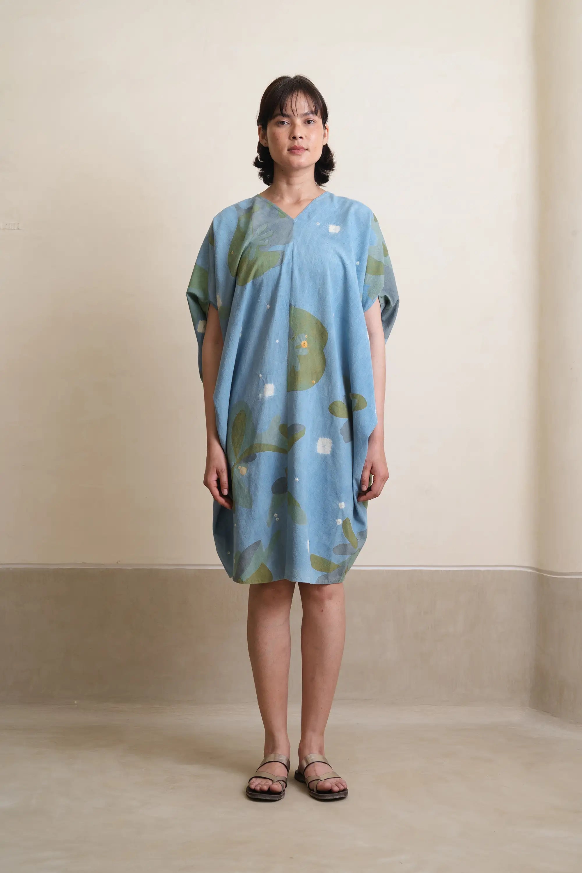 A woman wearing cotton sky indigo dress