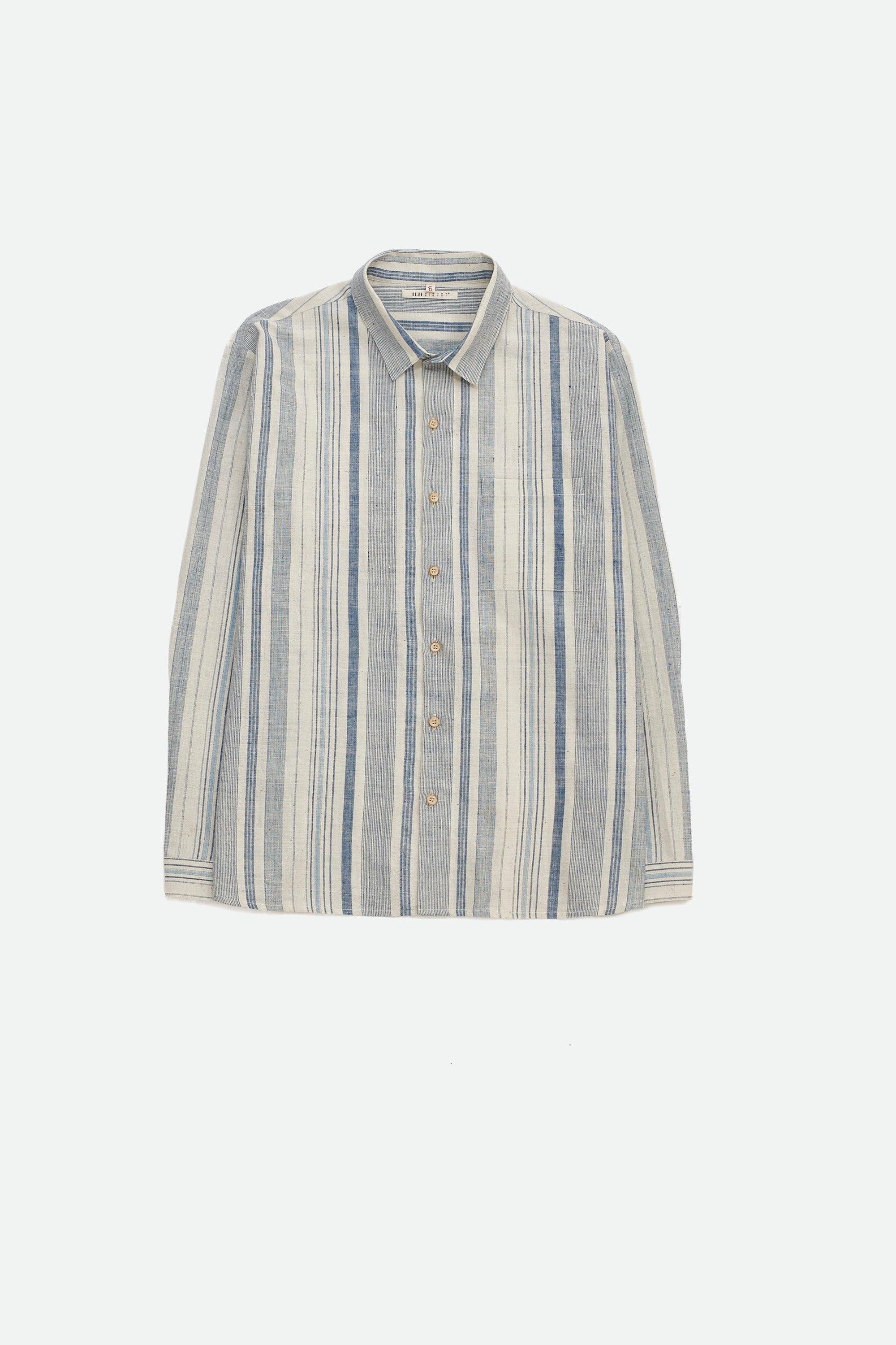 A man wearing medium indigo yarn dyed shirt