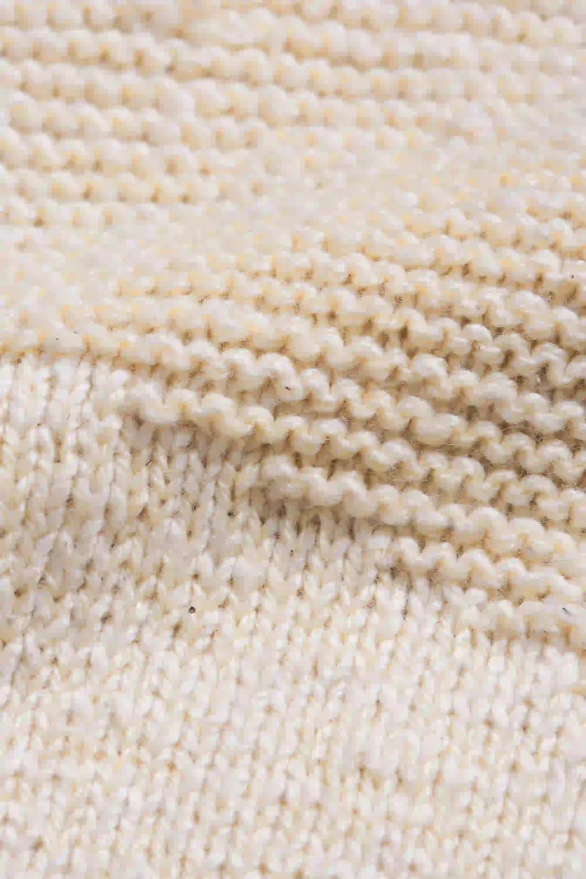 Sleeveless Knitted Cardigan in Ecru