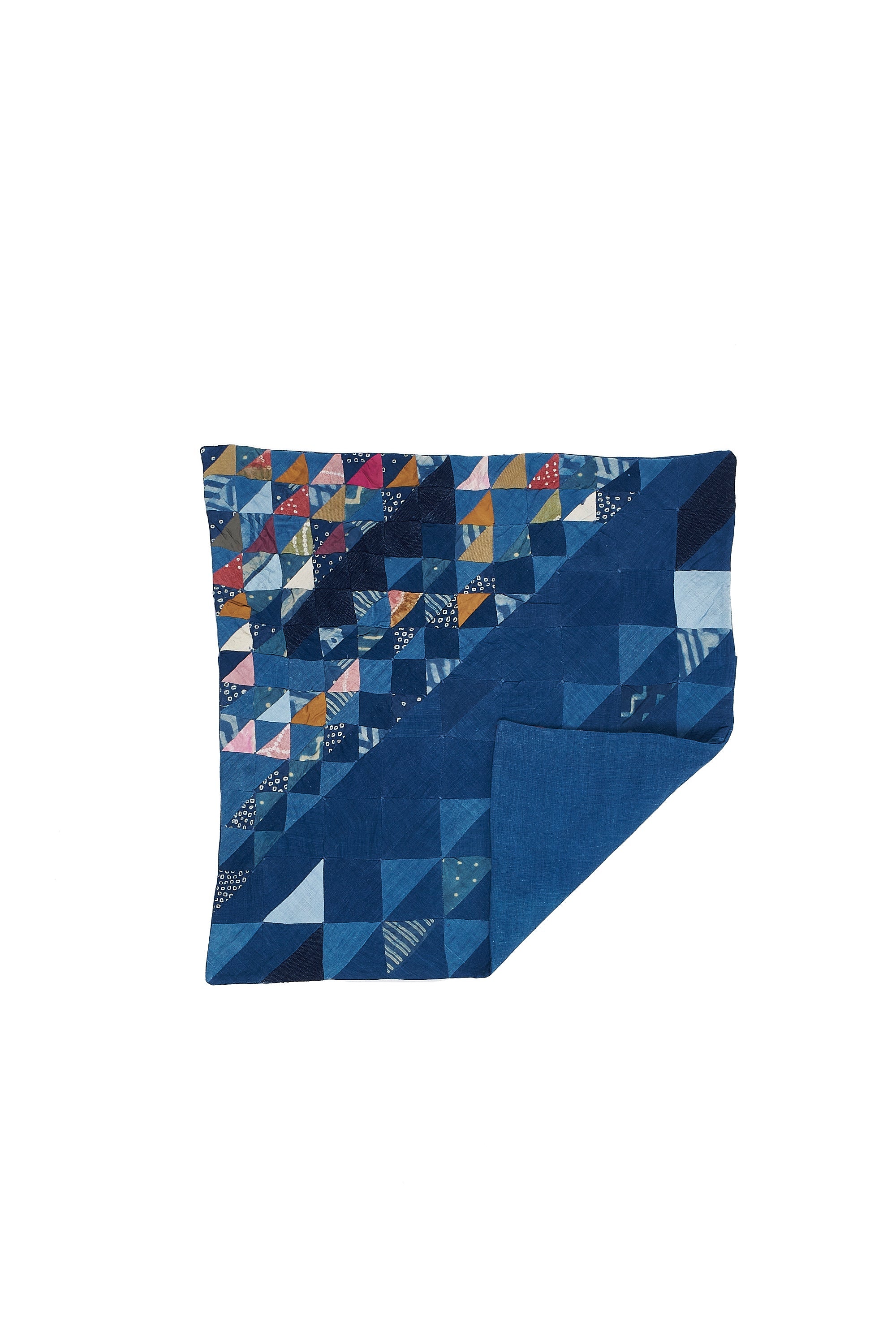 ANGULAR PATCHWORK CUSHION IN SHADES OF INDIGO