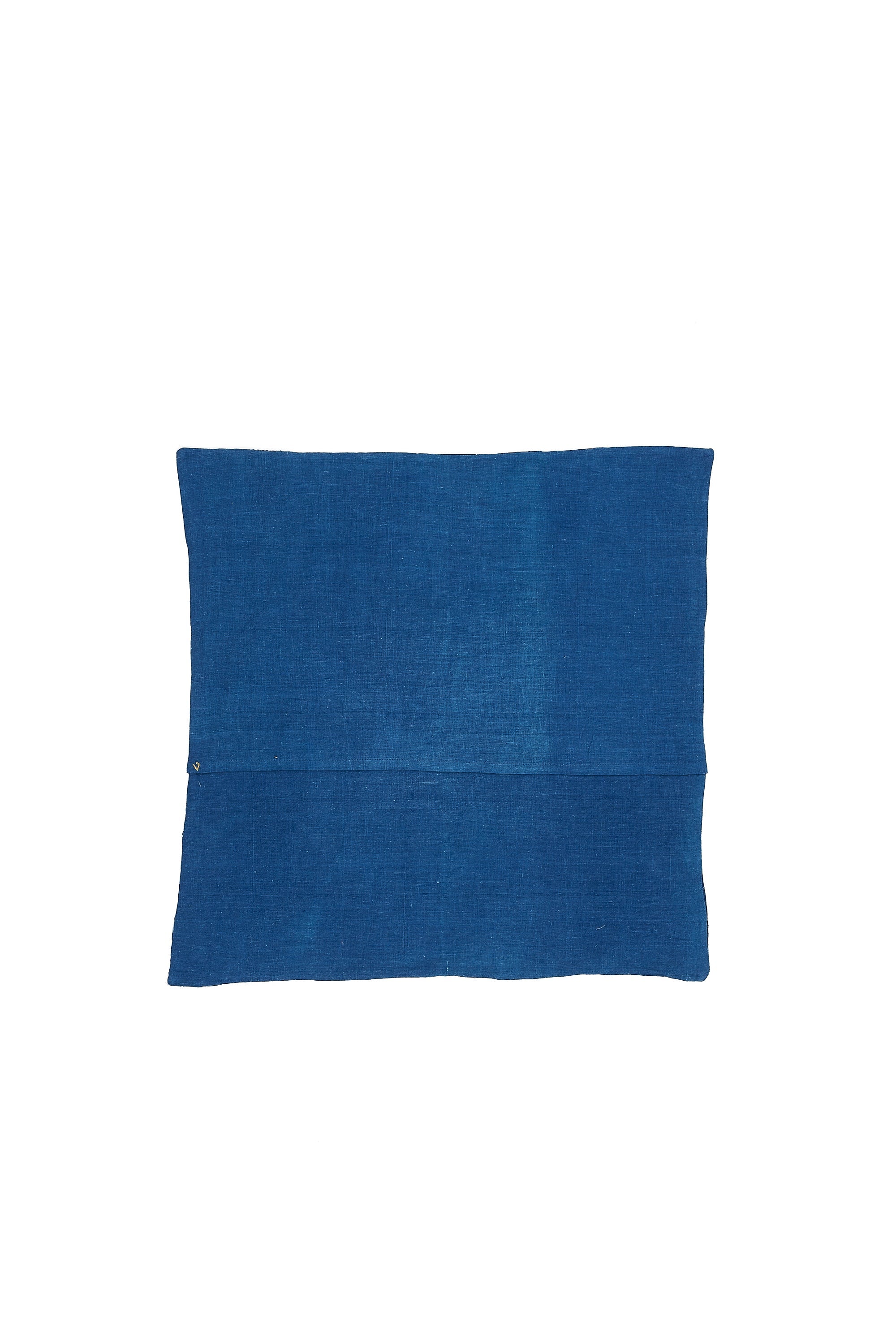 ANGULAR PATCHWORK CUSHION IN SHADES OF INDIGO