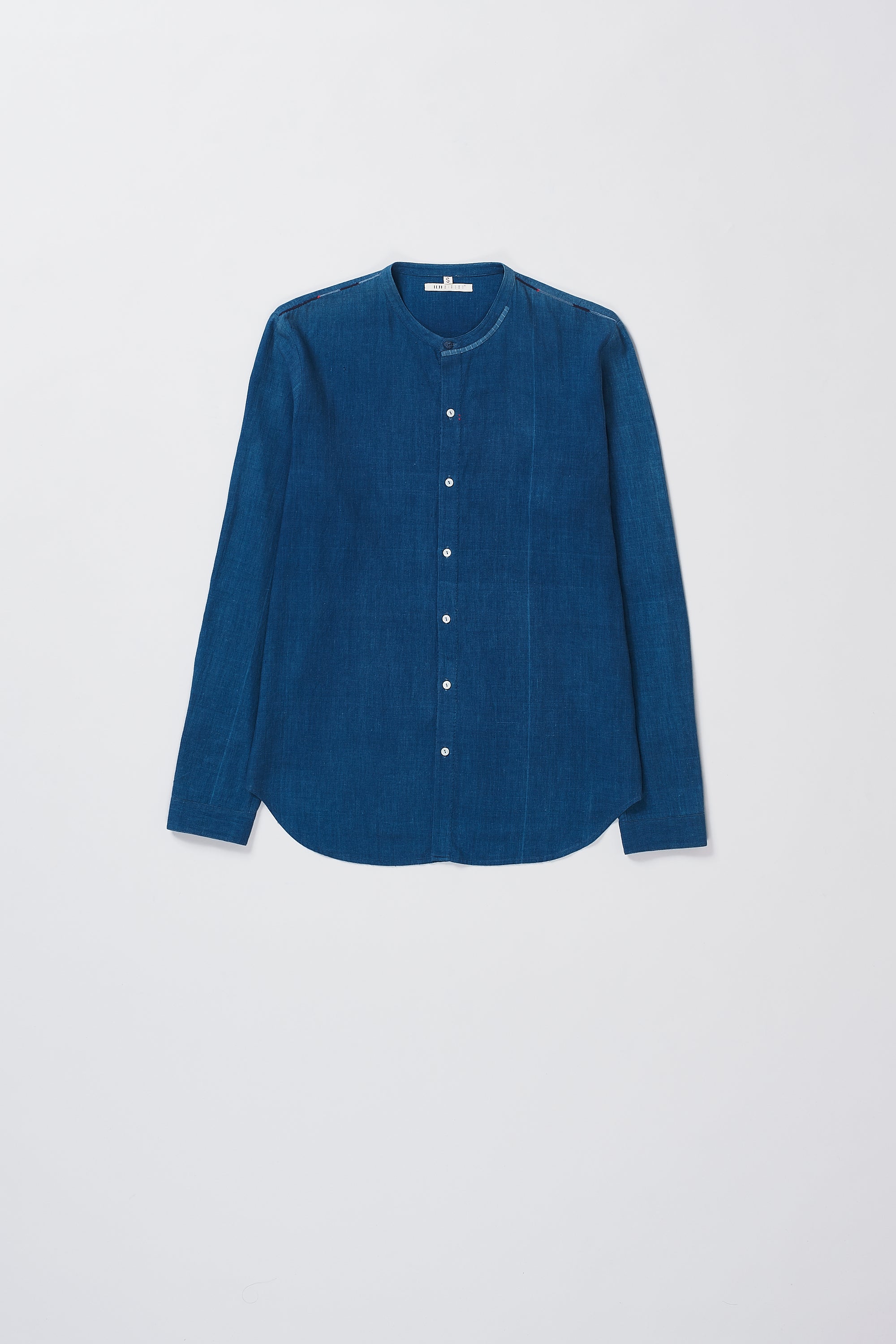 Front image of cotton medium indigo shirt with hand details