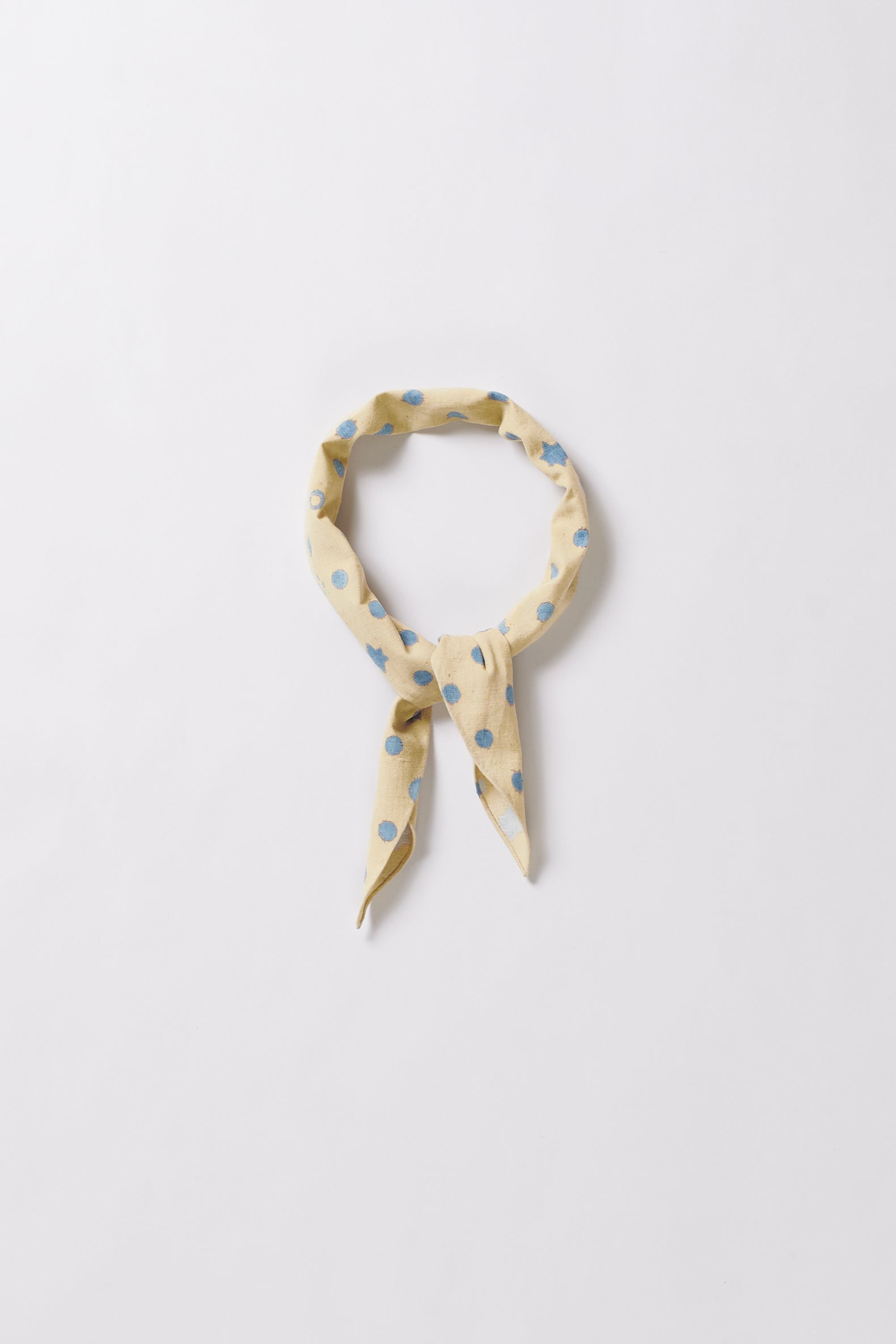 Whiskey gold cotton bandana on a white background