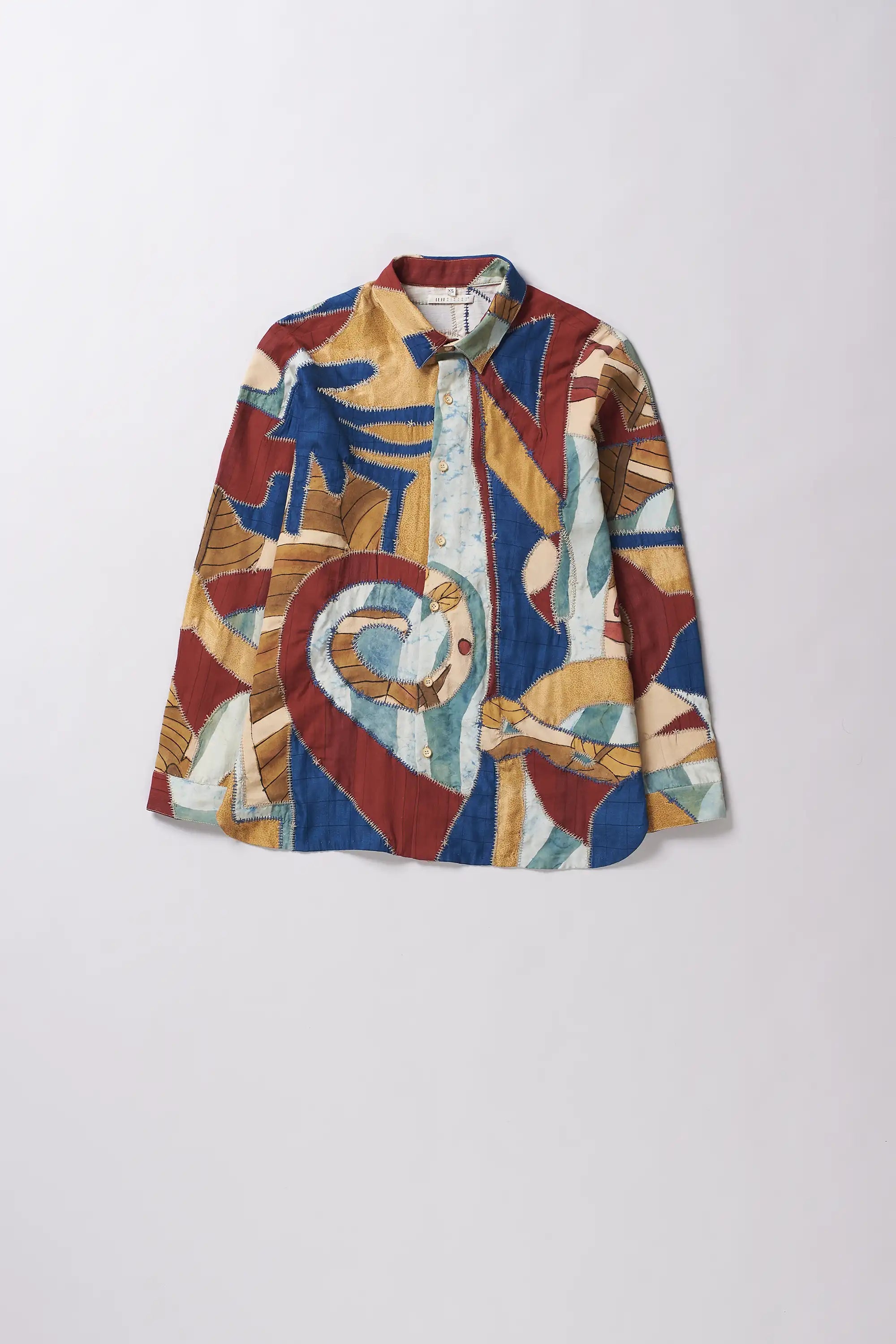 Front shot of shirt with patchwork in multi colour