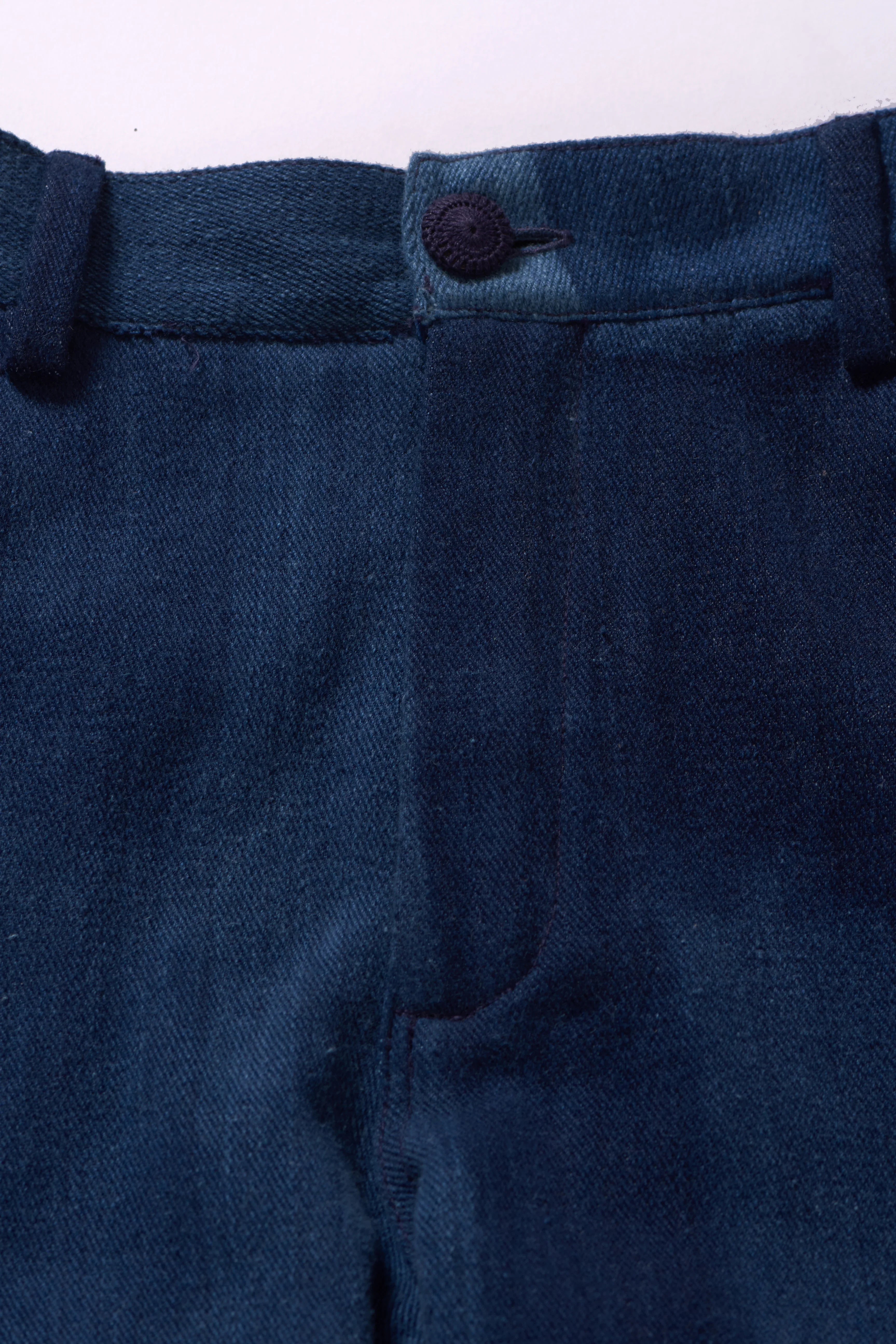 INDIGO PATCHWORK PLEATED TROUSERS