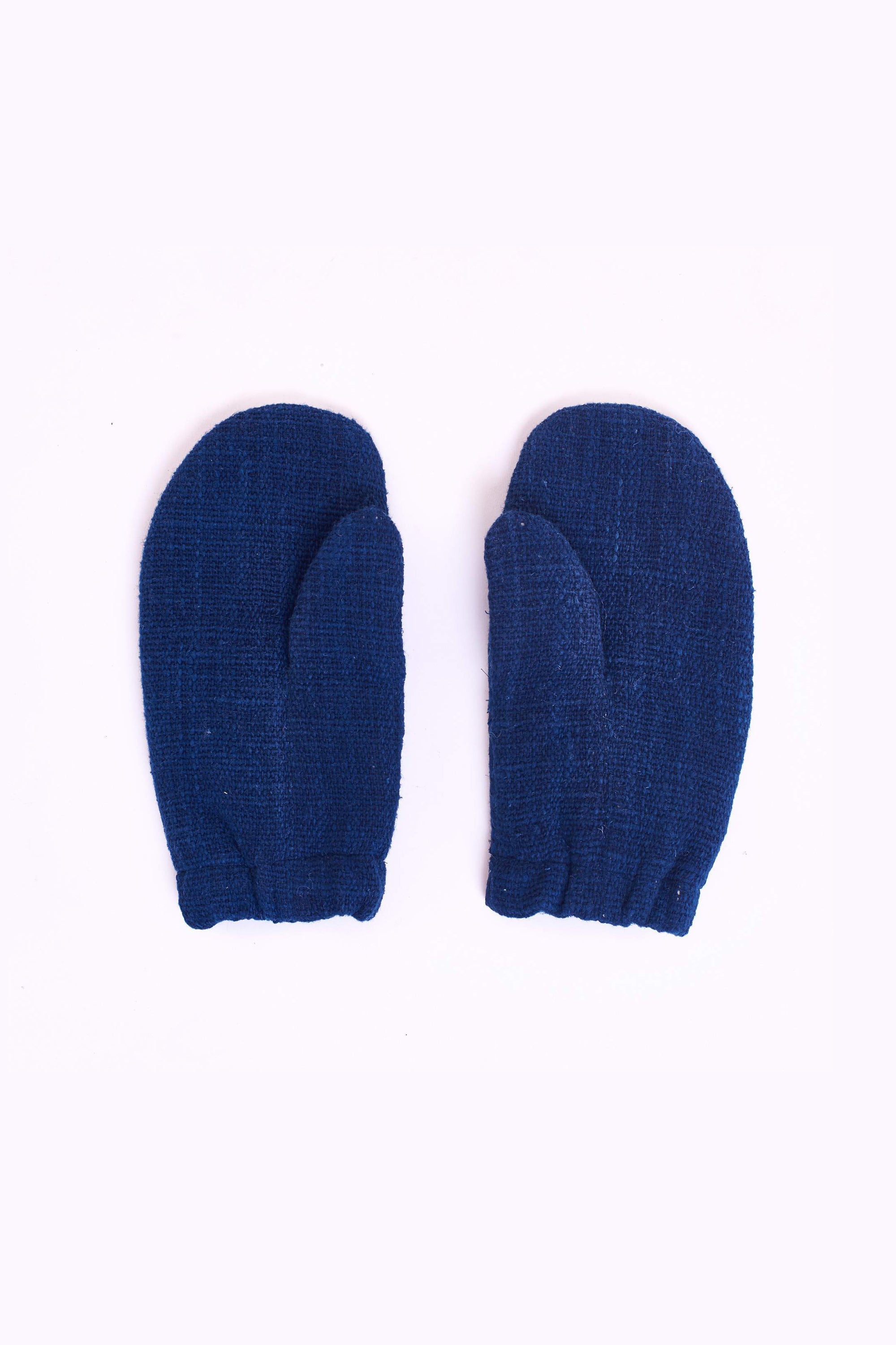 Back image of a indigo patchwork mittens