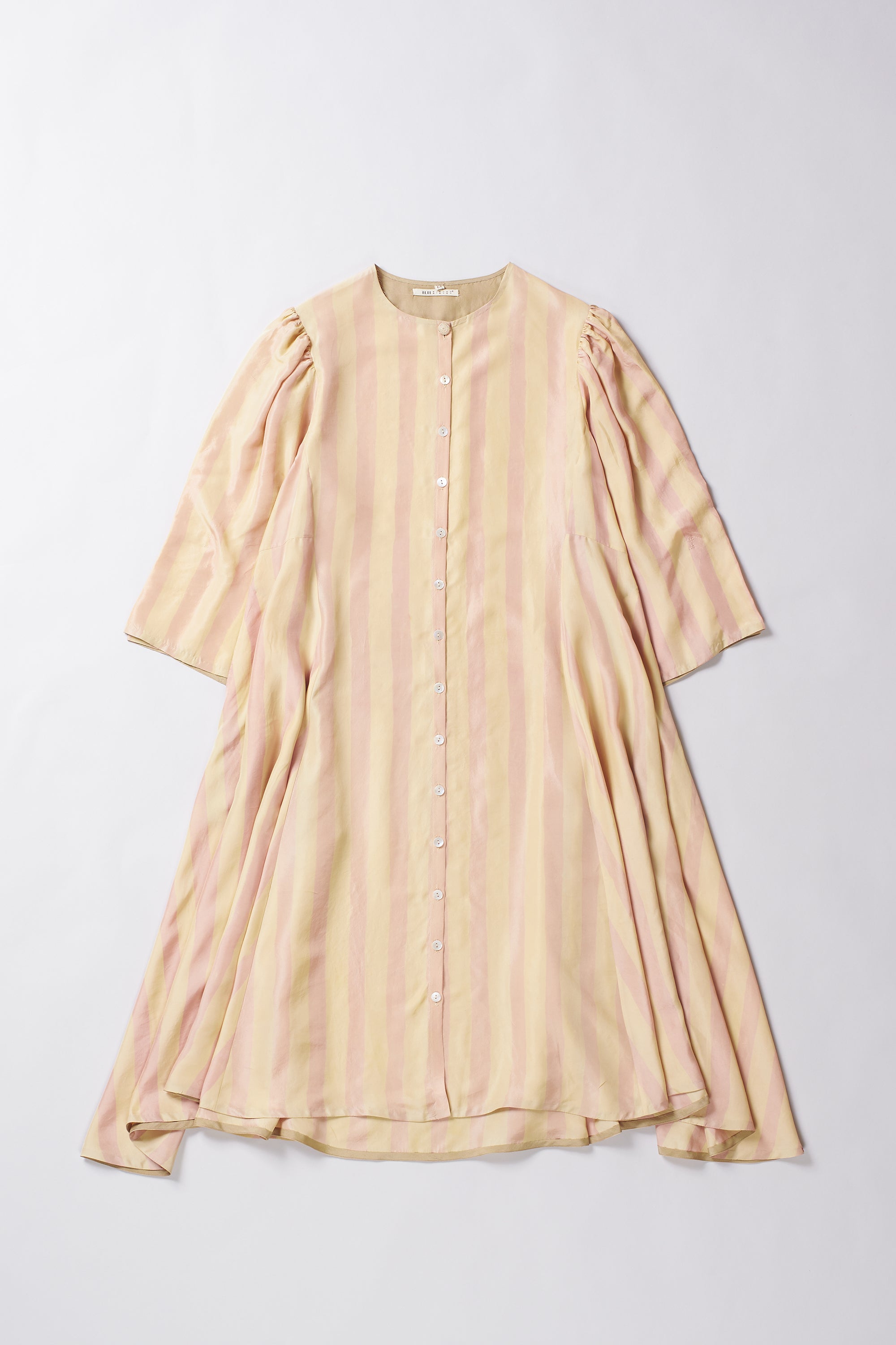 Beige dress with puff sleeves