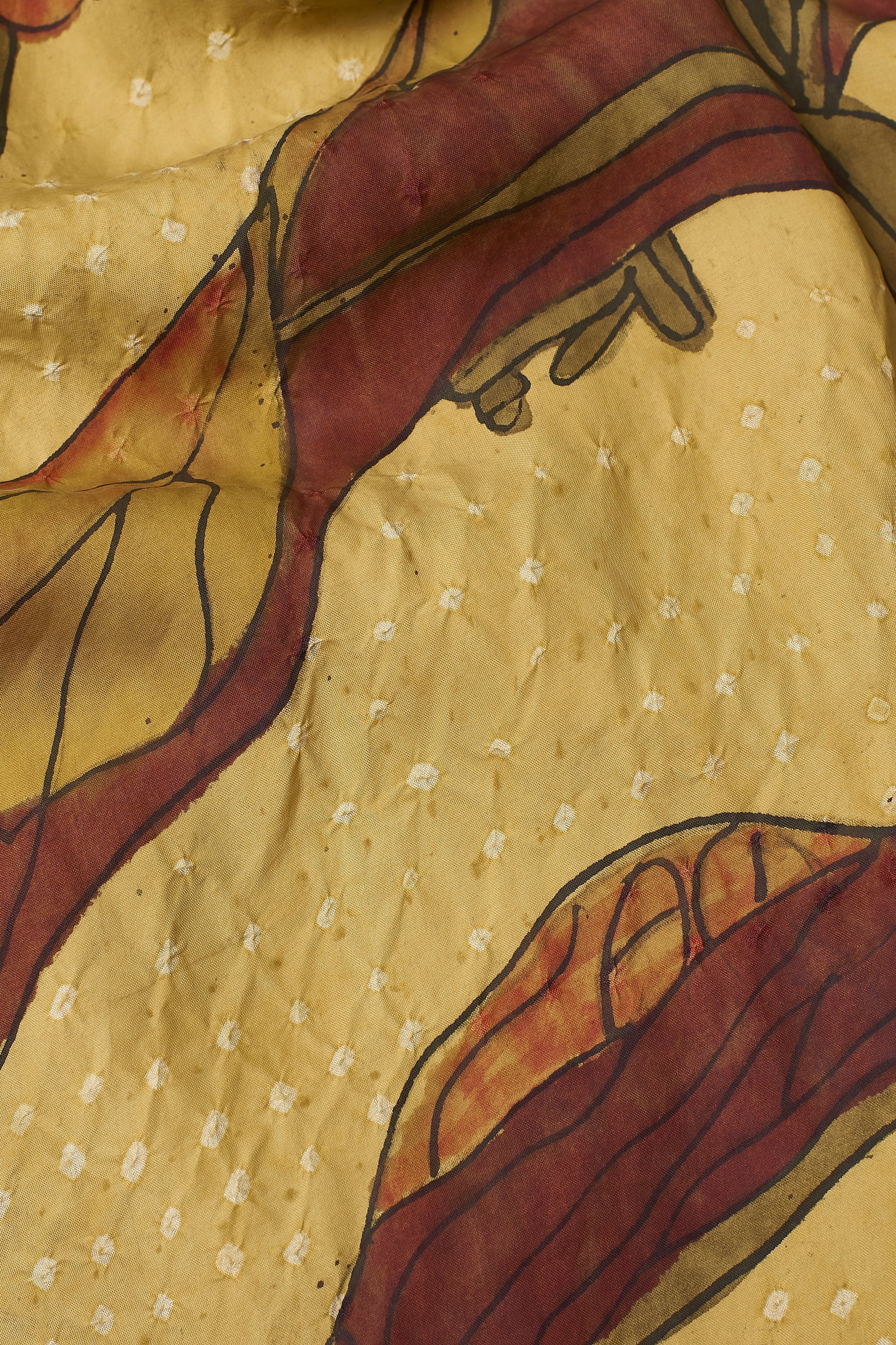Close-up of a fabric with stylized floral patterns