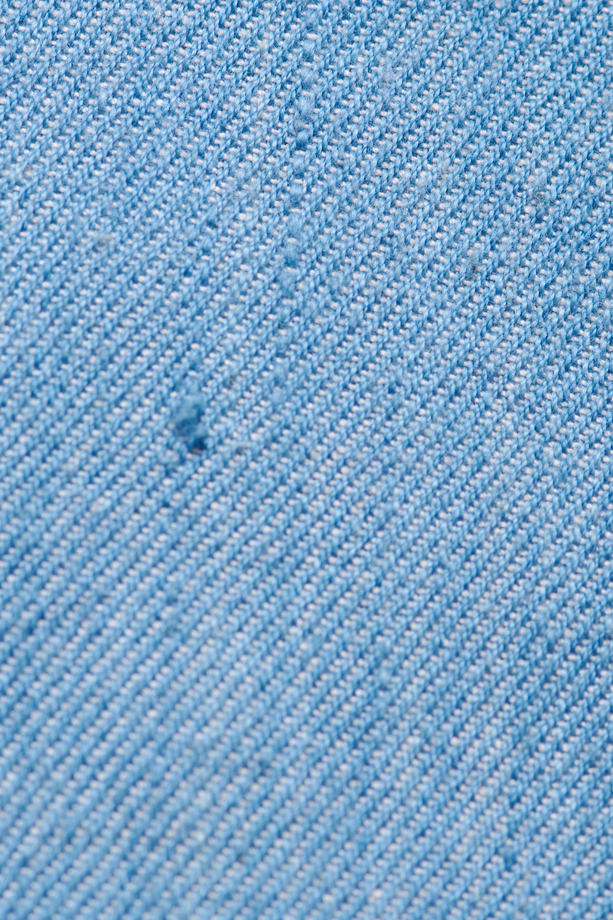 INDIGO-WASHED DEOXIDISED DENIM SHIRT