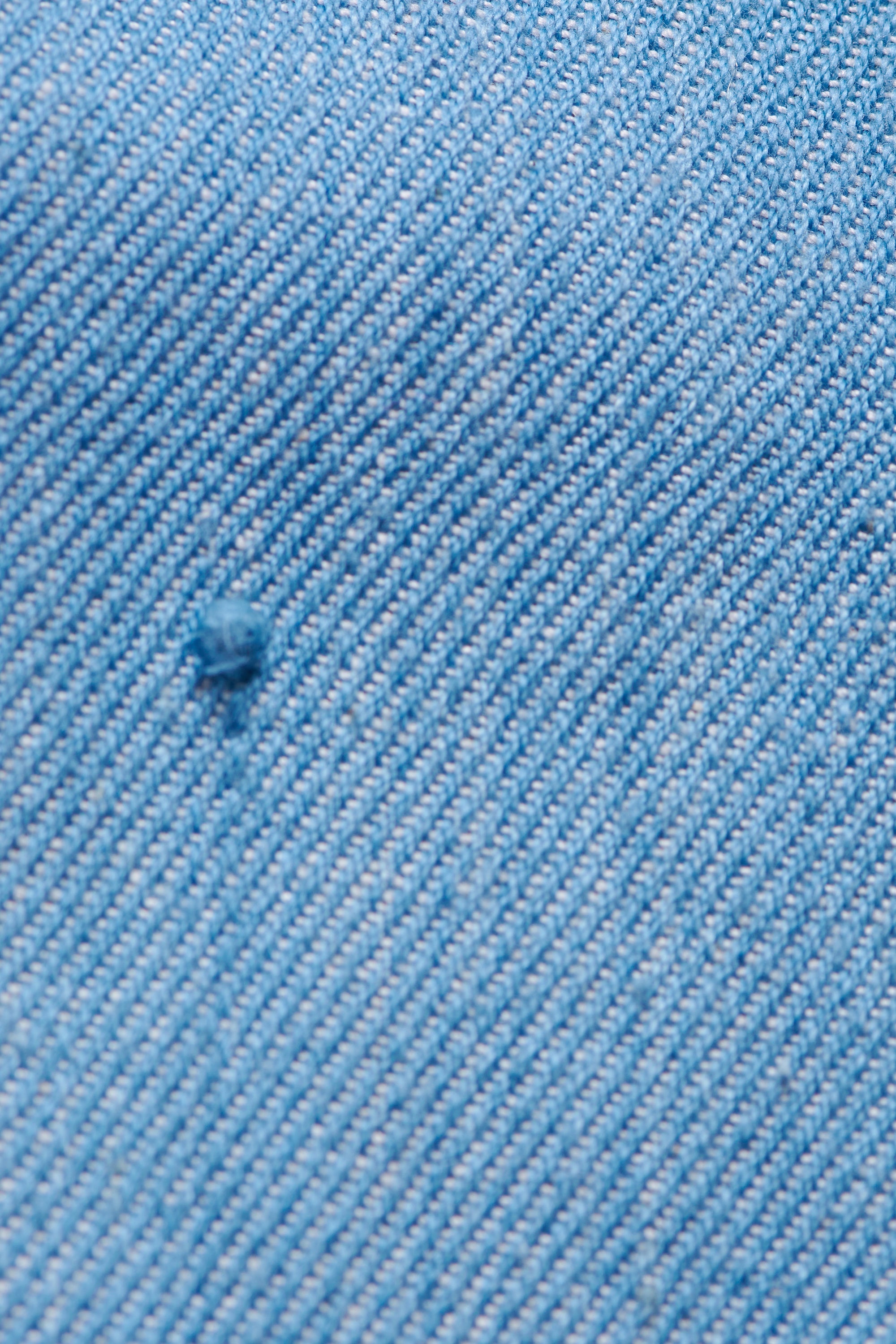 INDIGO-WASHED DEOXIDISED DENIM SHIRT
