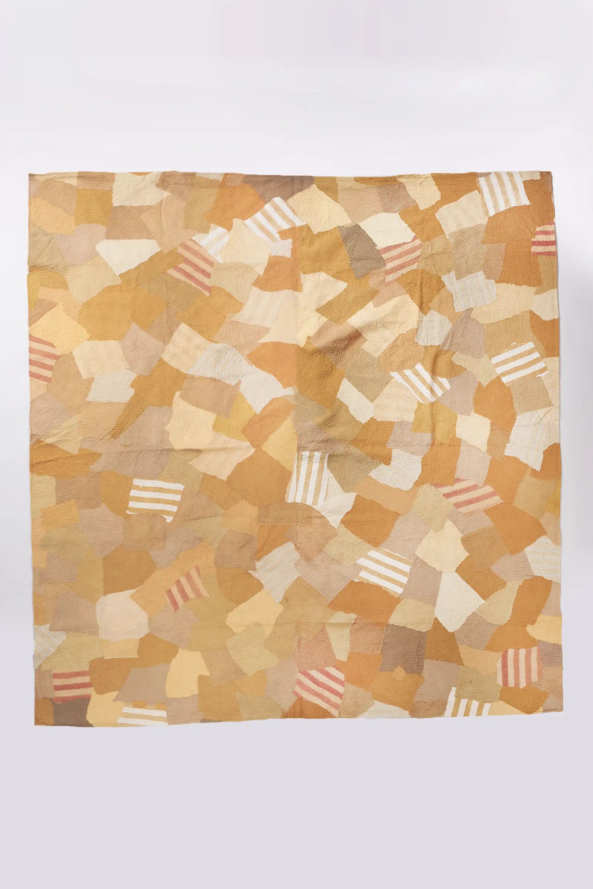 Patchwork quilt in shades of yellow