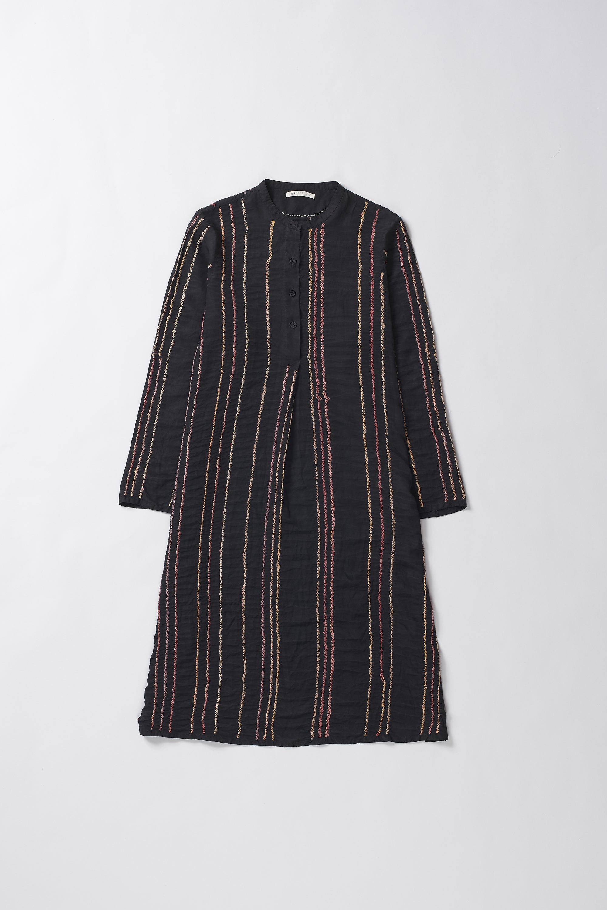 Black dress with thin red stripes on a white background