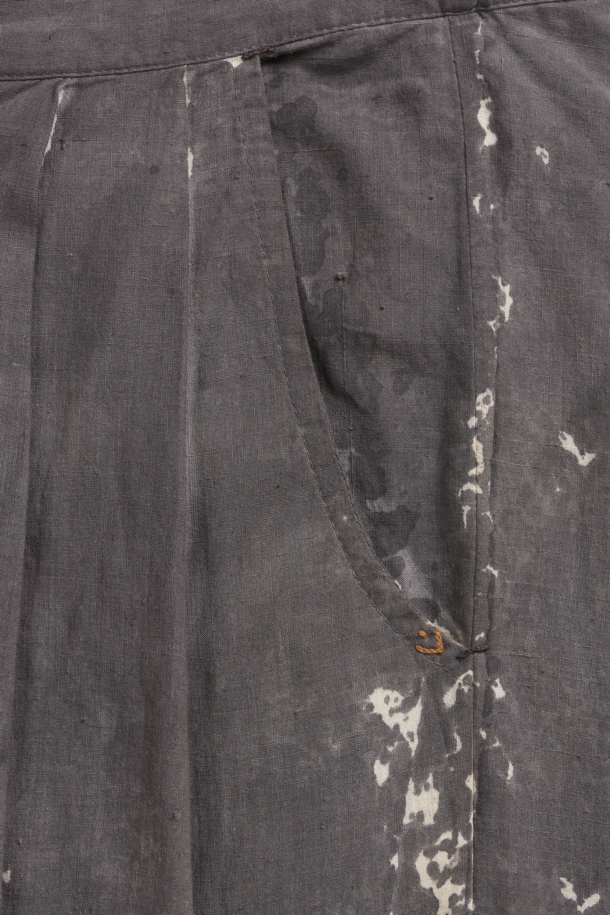Close-up of dark gray pants