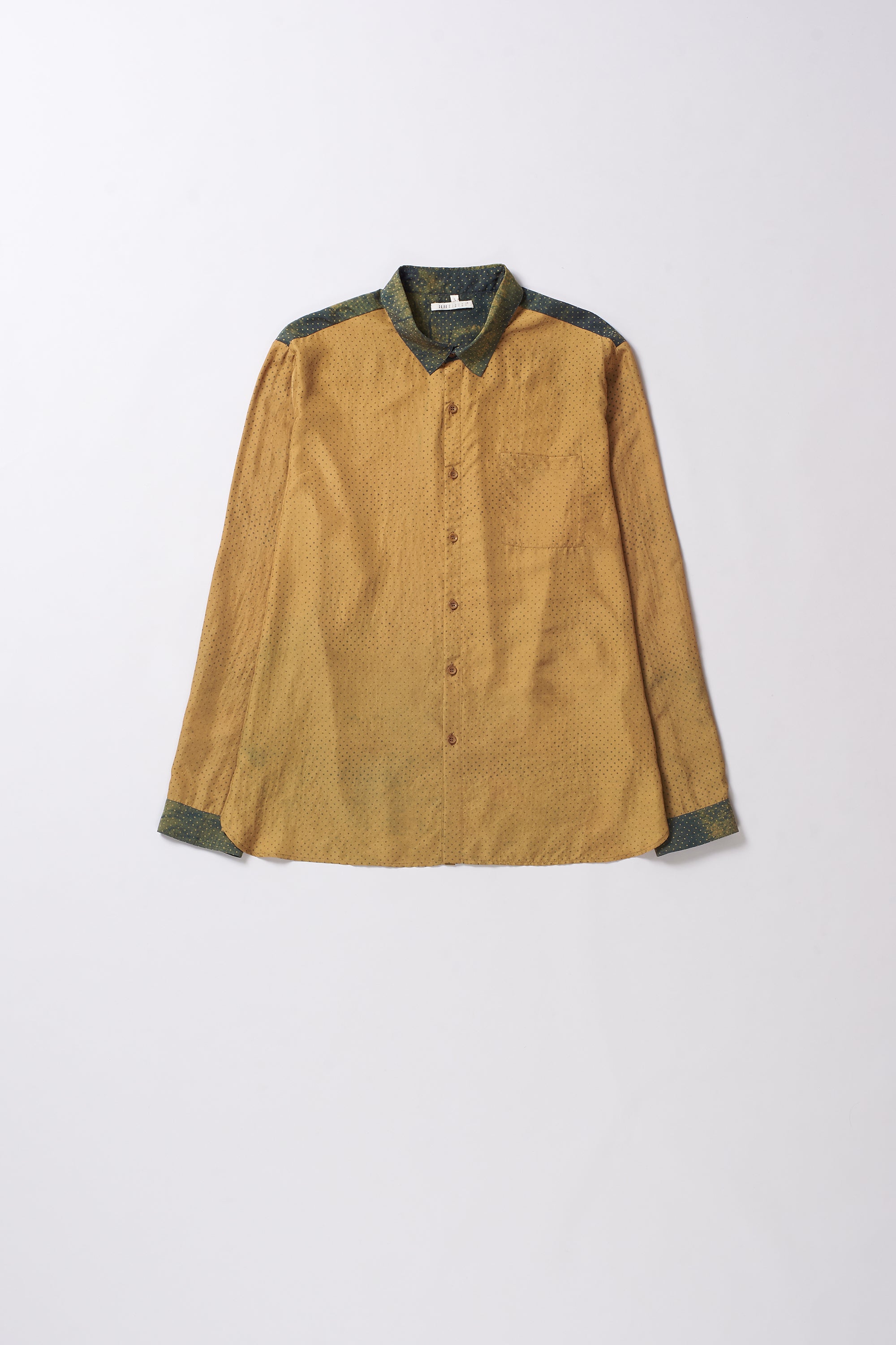 Brown shirt with green trim on a white background