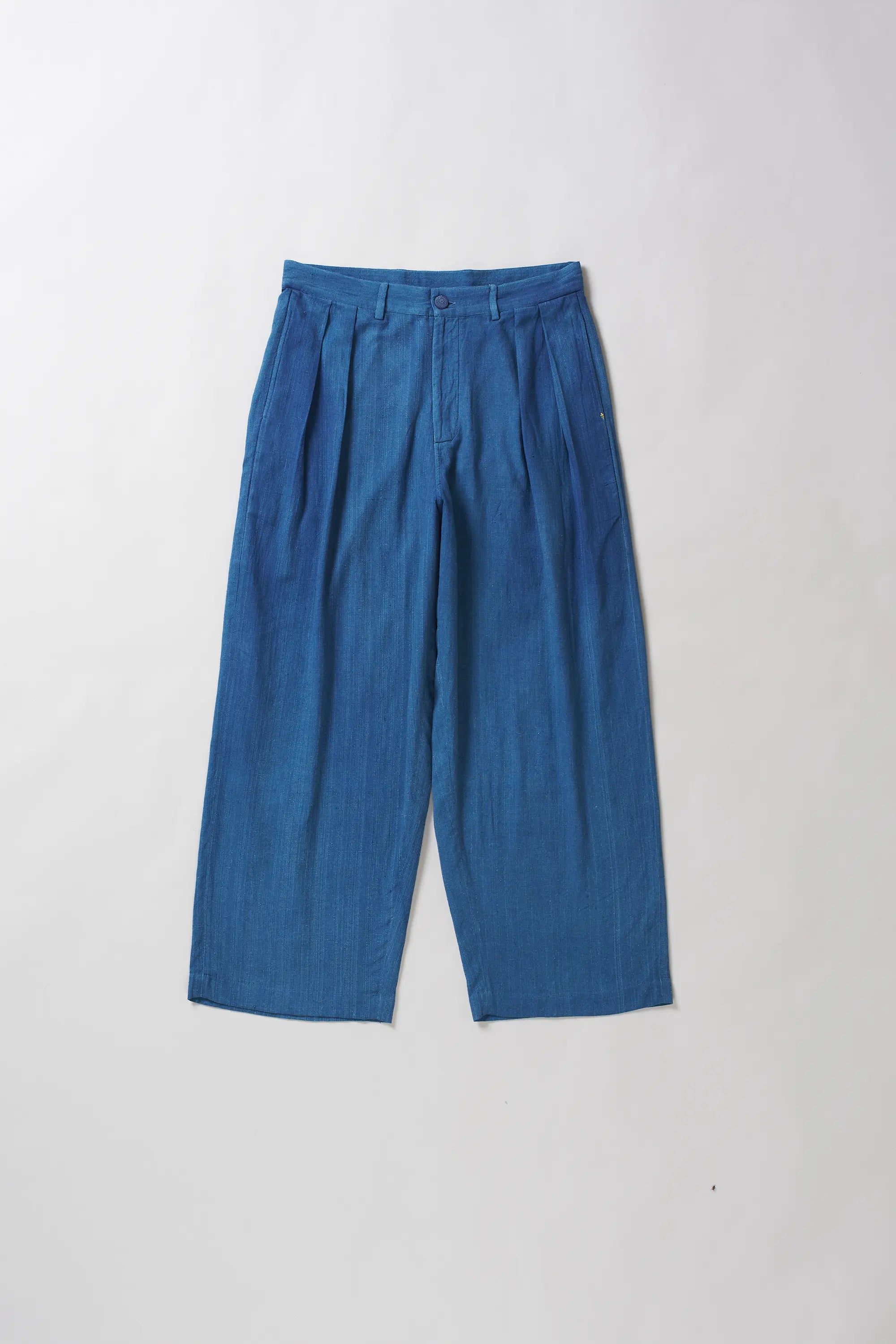 Front image of medium indigo cotton pant