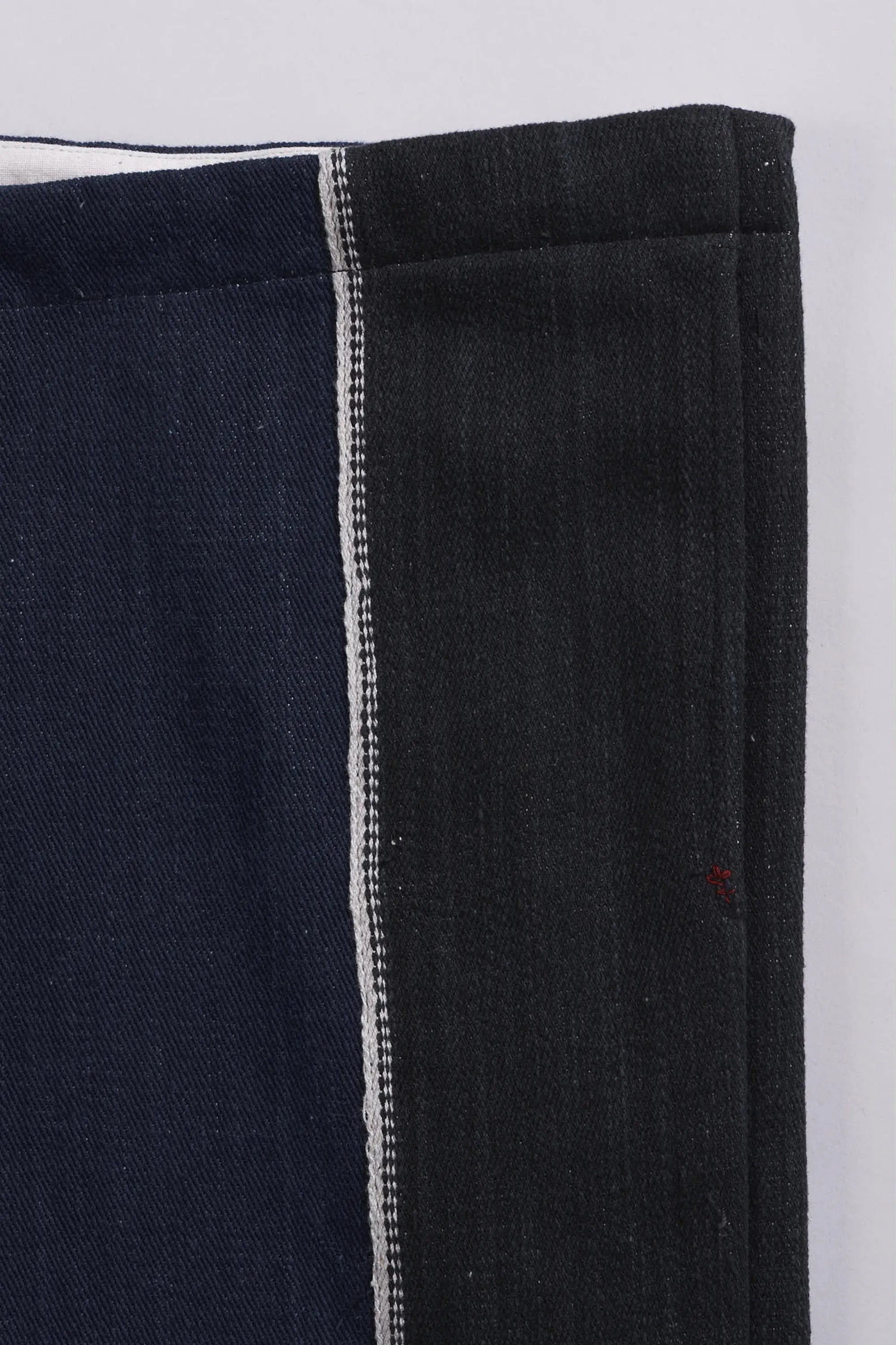 Close-up of black fabric on a white background