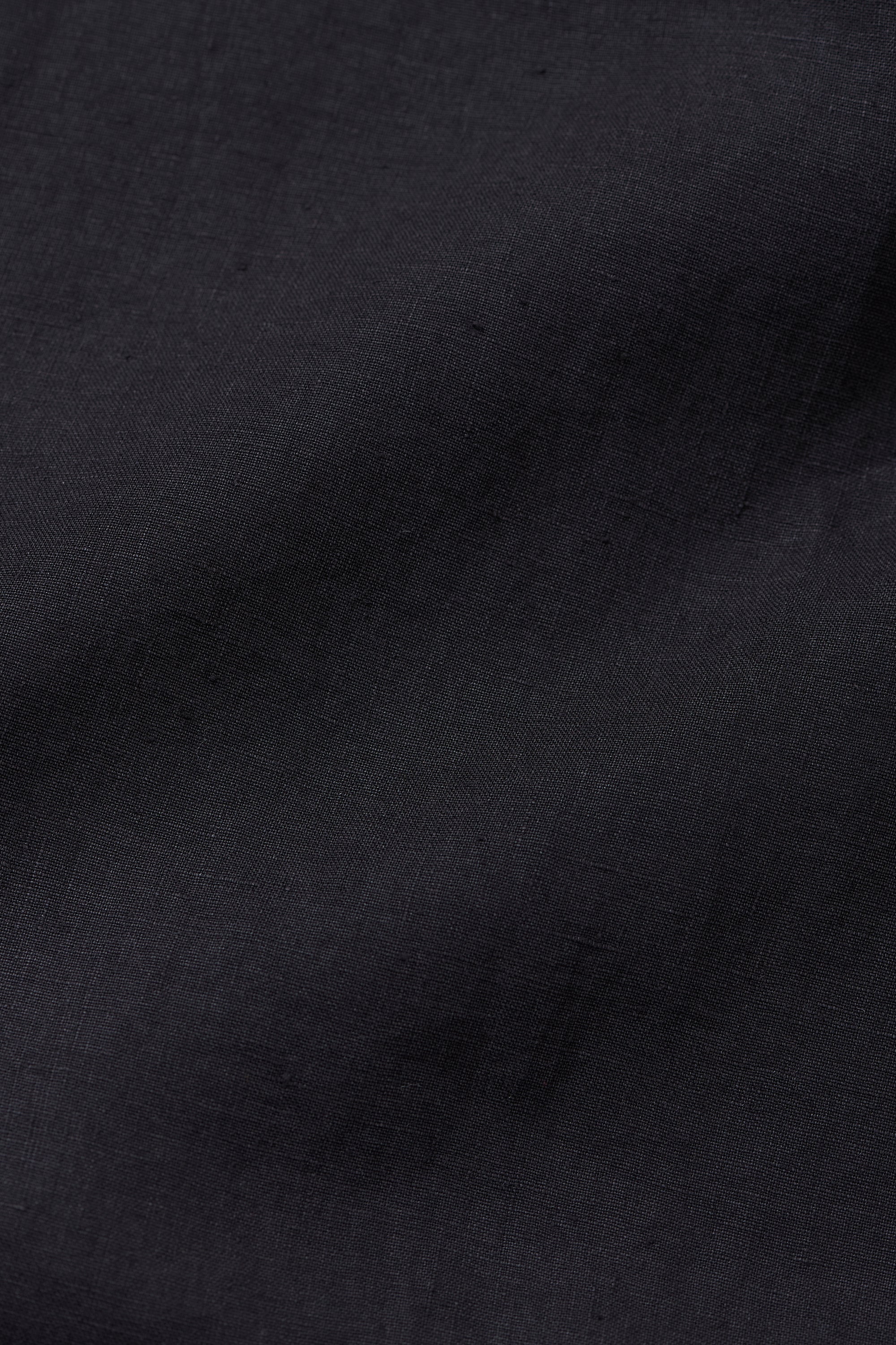 SCULPTURED PLEATED DRESS
