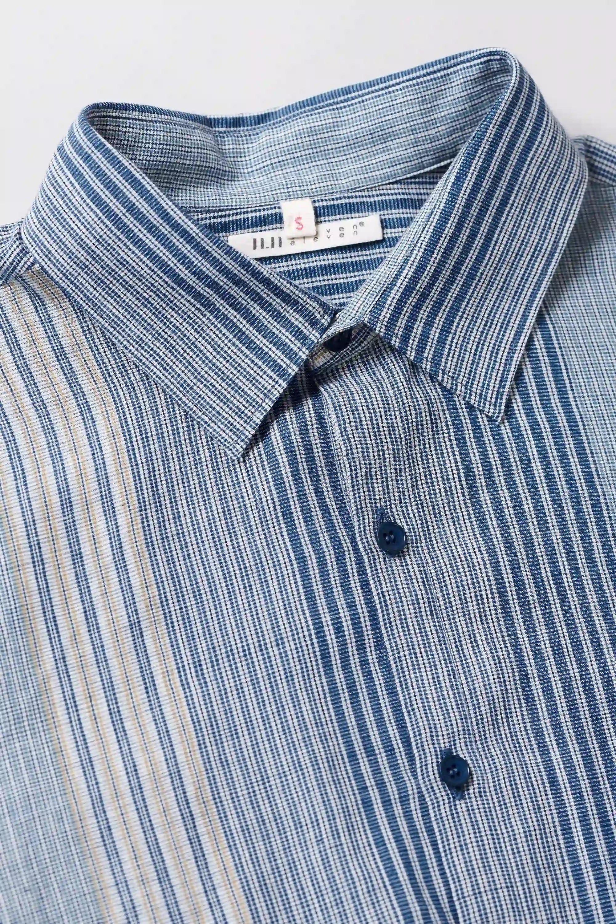 Fabric close-up with collar and buttons