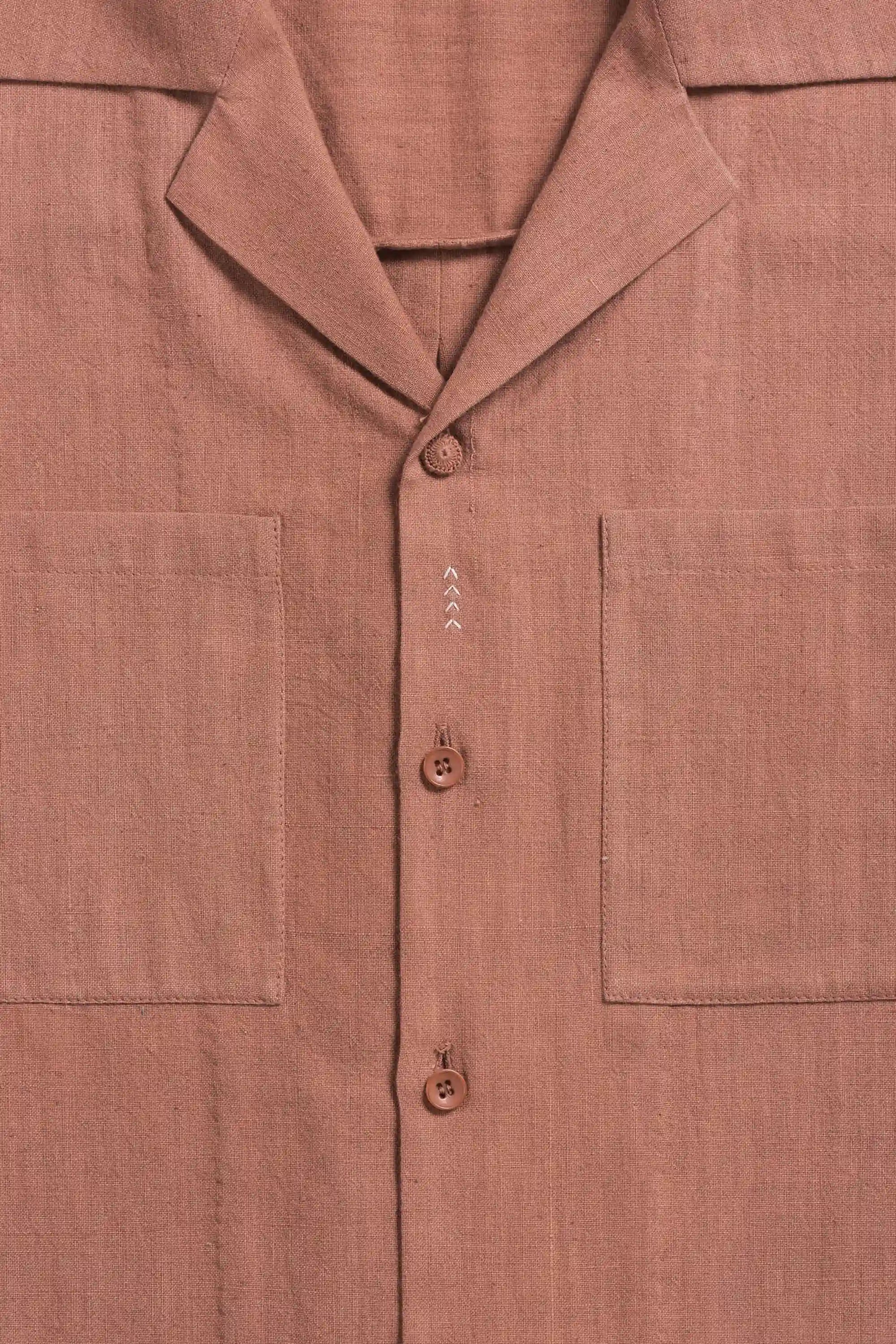Close-up of a shirt with buttons and collar details
